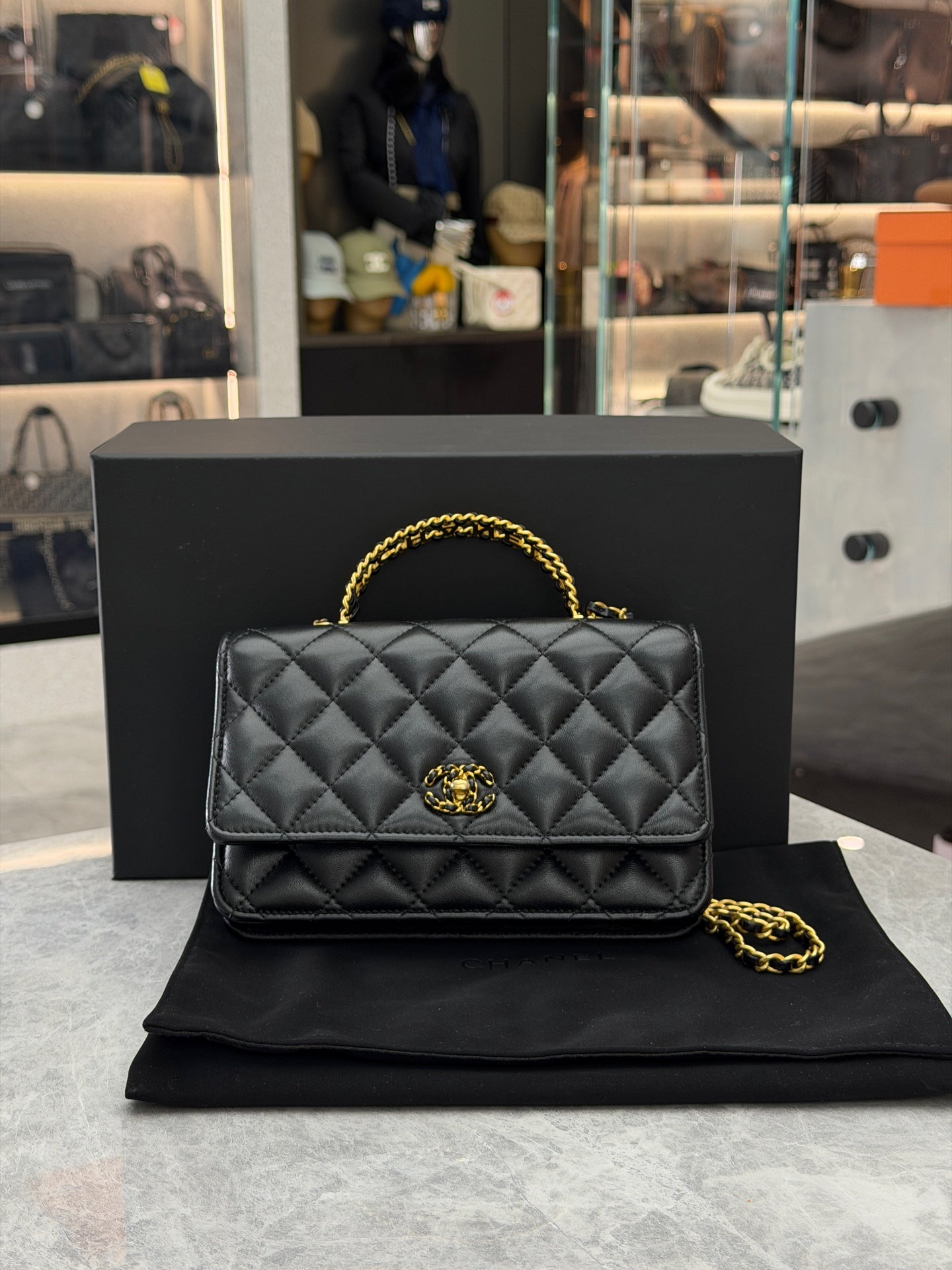 Chanel 24C Handle WOC black lambskin gold hardware view 1