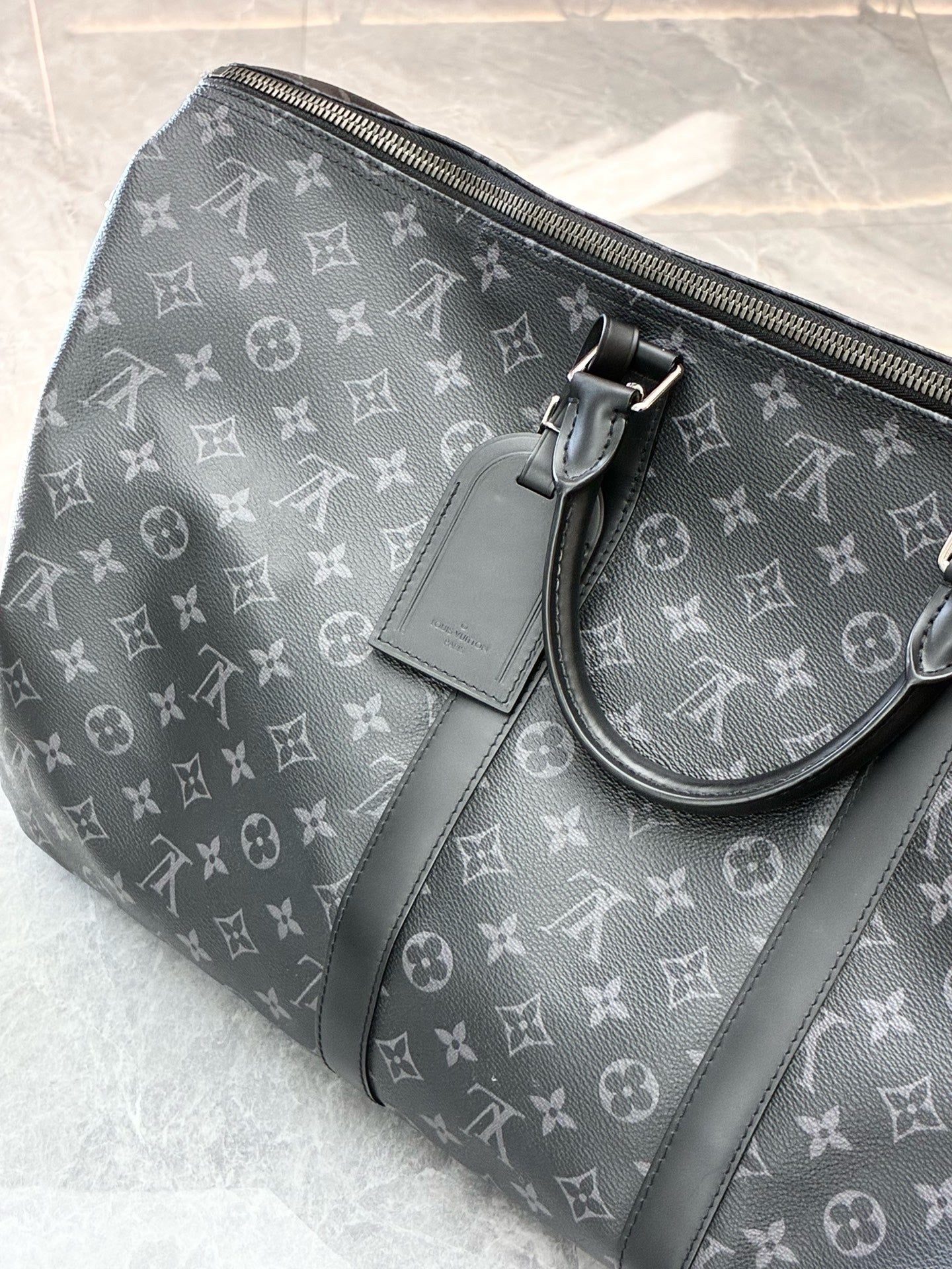 LOUIS VUITTON Keepall 55 – Monogram Eclipse Canvas, Black Cowhide, Matte Black Hardware, 55 cm, Excellent Pre-Owned