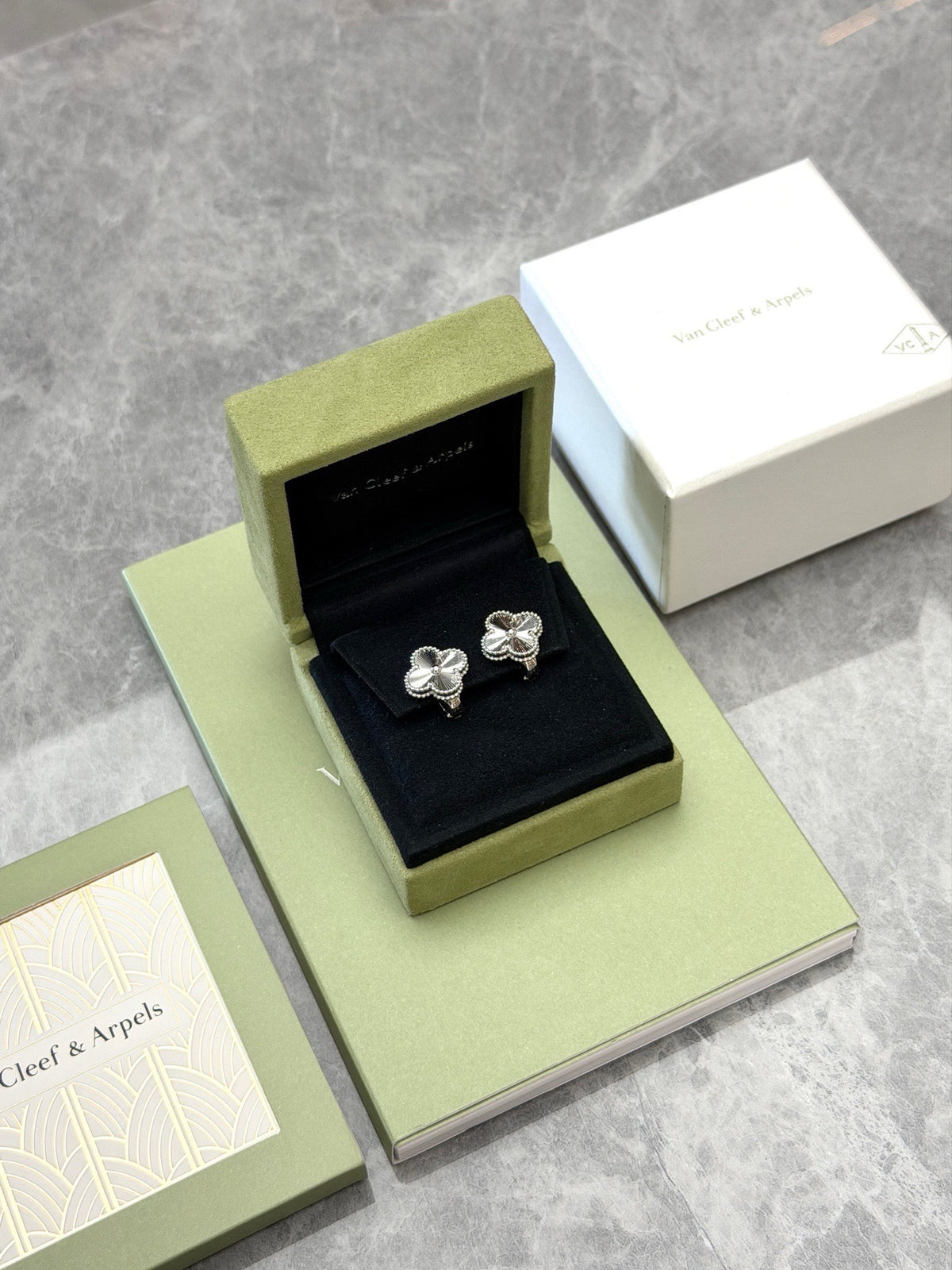 VAN CLEEF & ARPELS Vintage Alhambra Earrings – 18K White Gold Guilloché, 2023 Certificate, Excellent Pre-Owned