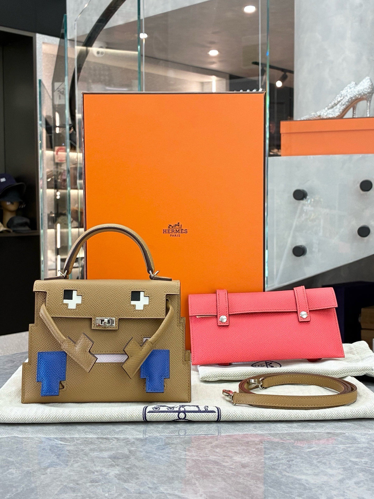 HERMÈS Kelly Doll – Biscuit Epsom with Bleu France Pixel Mosaic, Palladium Hardware, W Stamp, Brand New