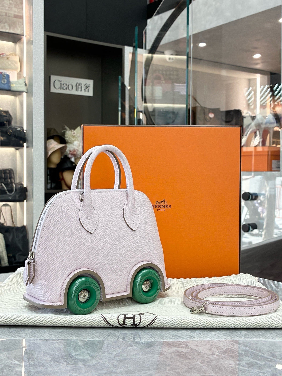 HERMÈS Bolide on Wheels – Pale Lilac Epsom with Green Wheels, Palladium Hardware, W Stamp, Excellent Pre-Owned