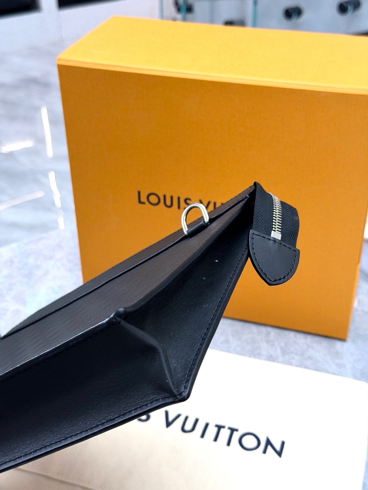 LOUIS VUITTON Pochette Voyage MM – Damier Graphite Canvas with Black Leather Trim, Silver Hardware, Excellent Pre-Owned
