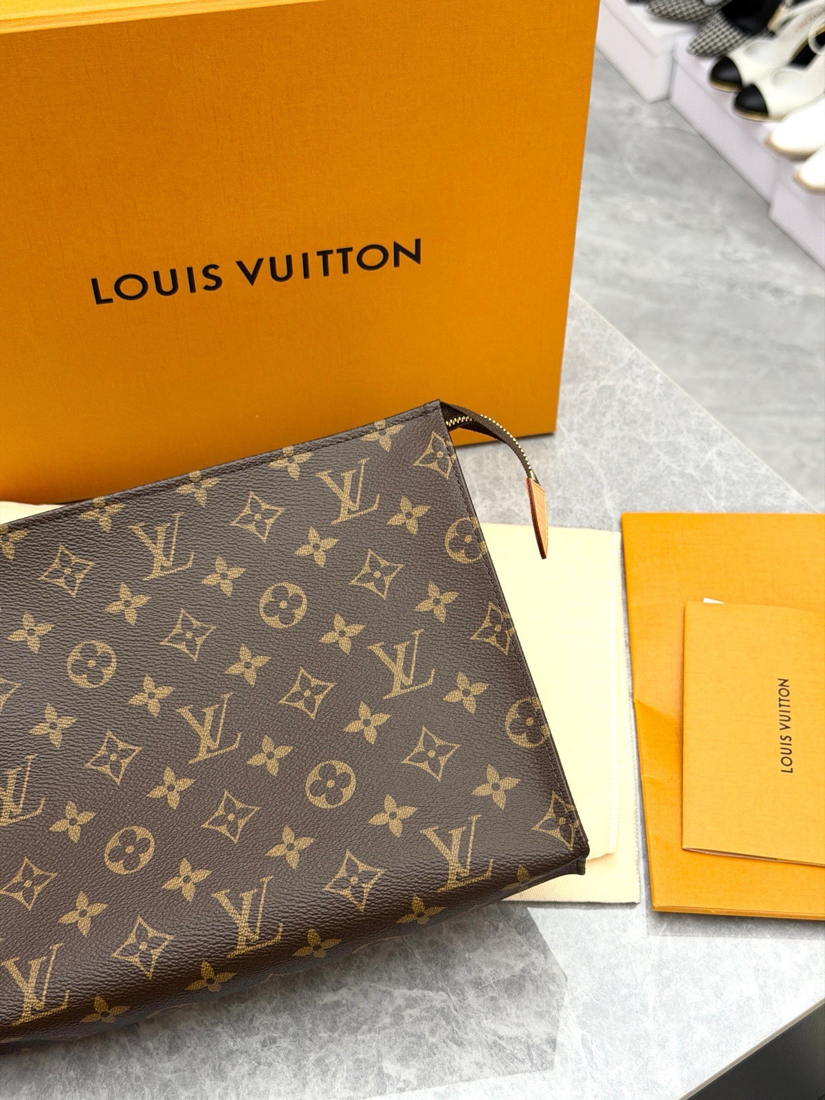 LOUIS VUITTON Toiletry Pouch 26 – Monogram Canvas with Natural Vachetta Leather, Good Pre-Owned