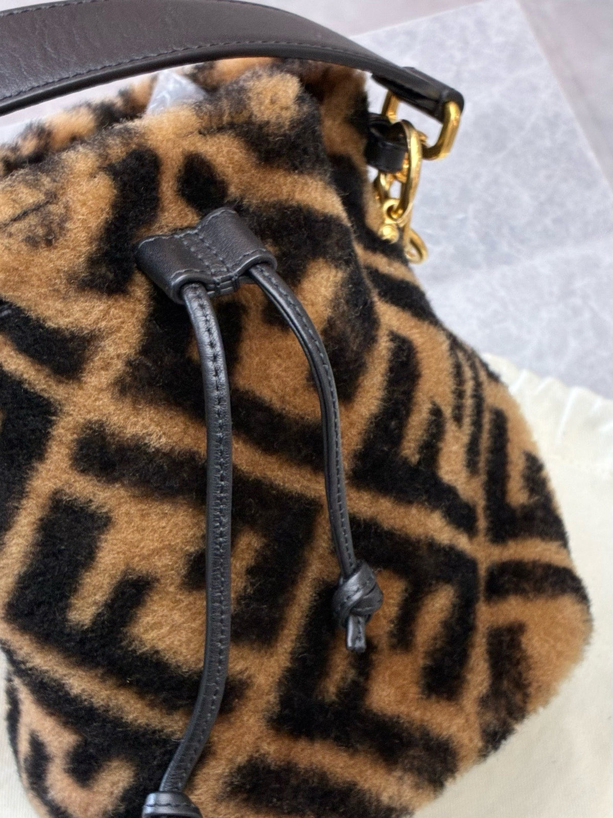 FENDI Mon Tresor Mini Bucket Bag – Shearling with Large FF Motif, Gold Hardware, Good Pre-Owned