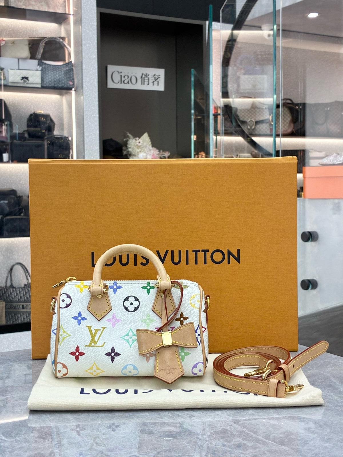 LOUIS VUITTON Nano Speedy – White Multicolor Monogram Canvas, Vachetta Trim, Gold Hardware, Microchip Era, Good Pre-Owned