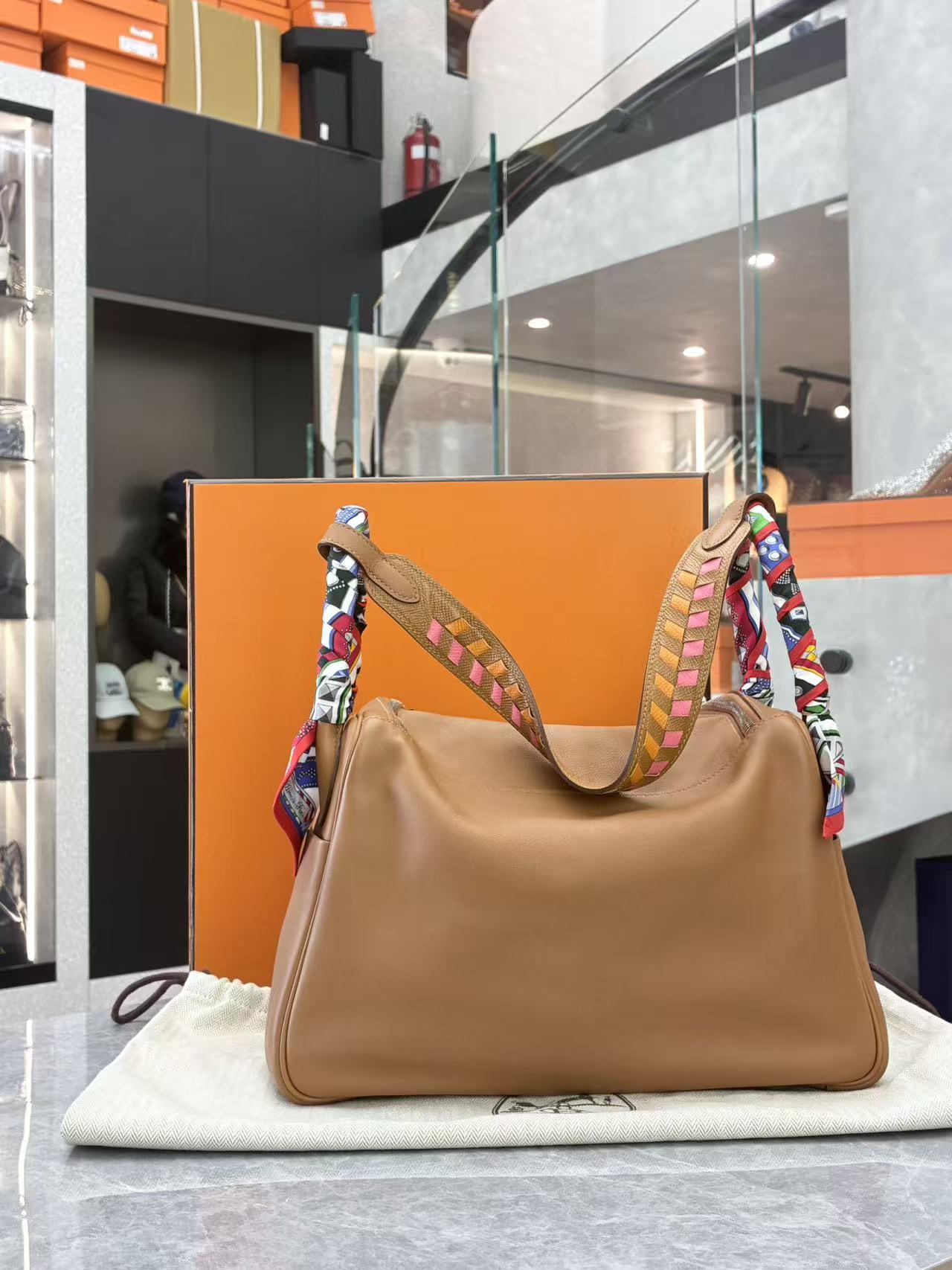 Hermès Lindy 30 Gold Swift leather with limited-edition woven strap back view