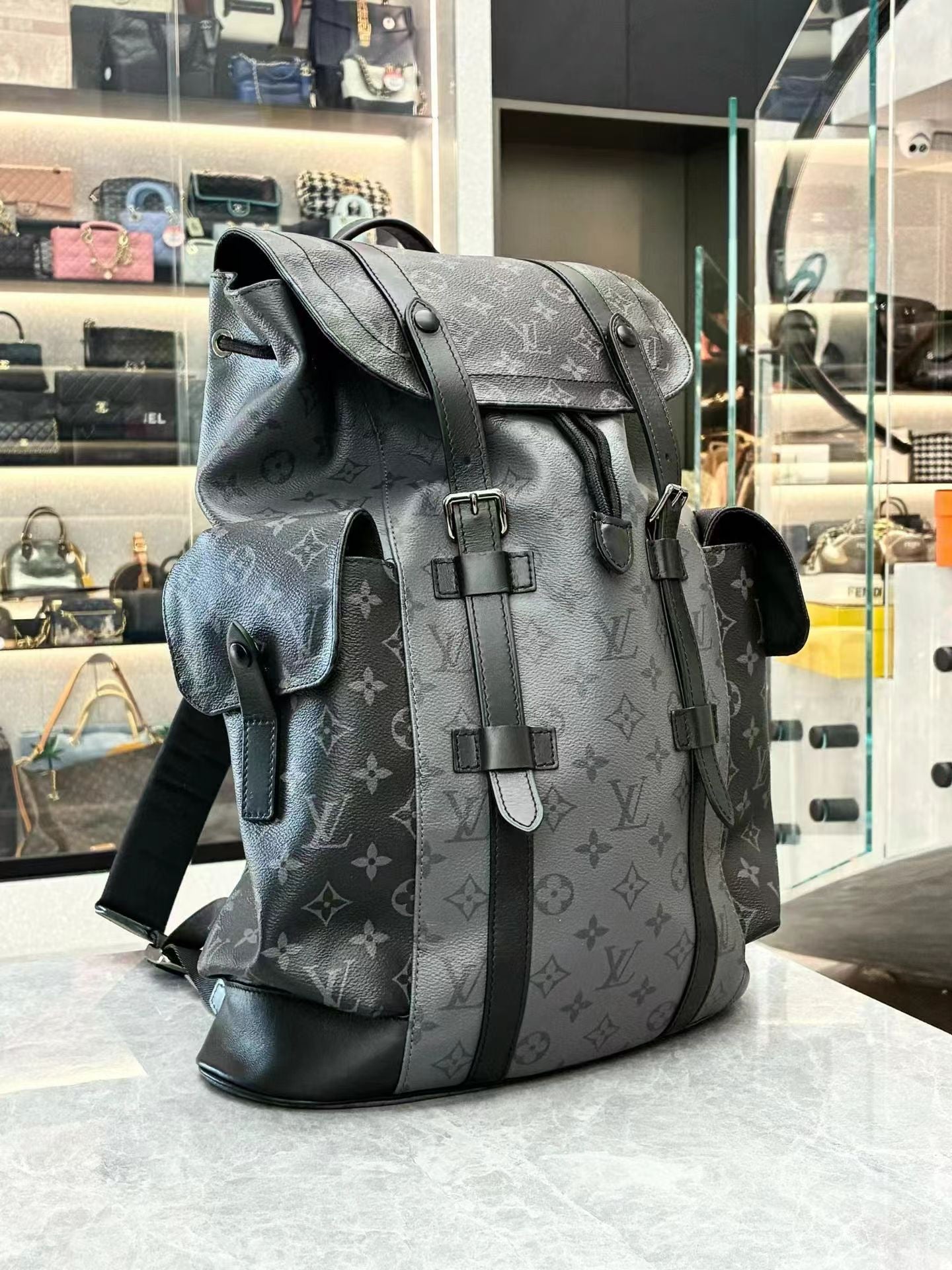 LOUIS VUITTON Christopher MM Monogram Eclipse backpack side view