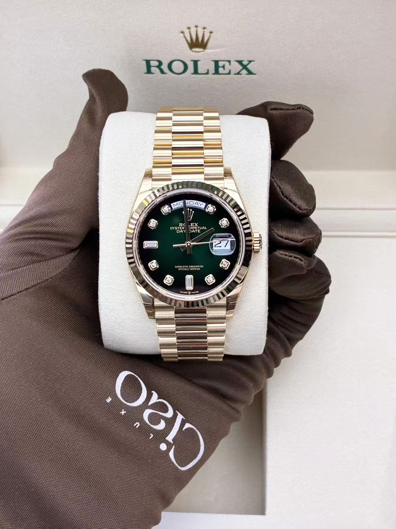 Rolex Day-Date 36 yellow gold watch with a green ombré diamond dial