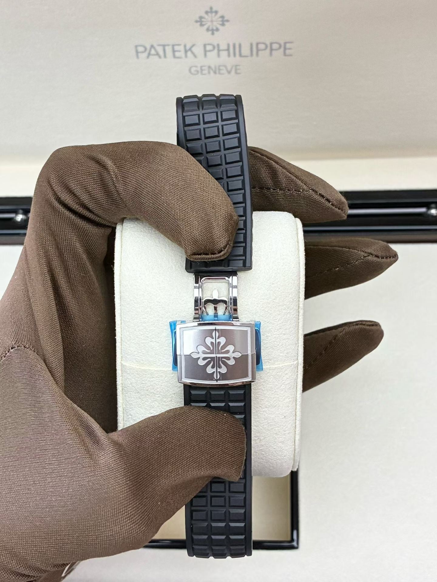 Patek Philippe Aquanaut Luce reference 5267/200A-001 featuring a black dial and diamond-set bezel.