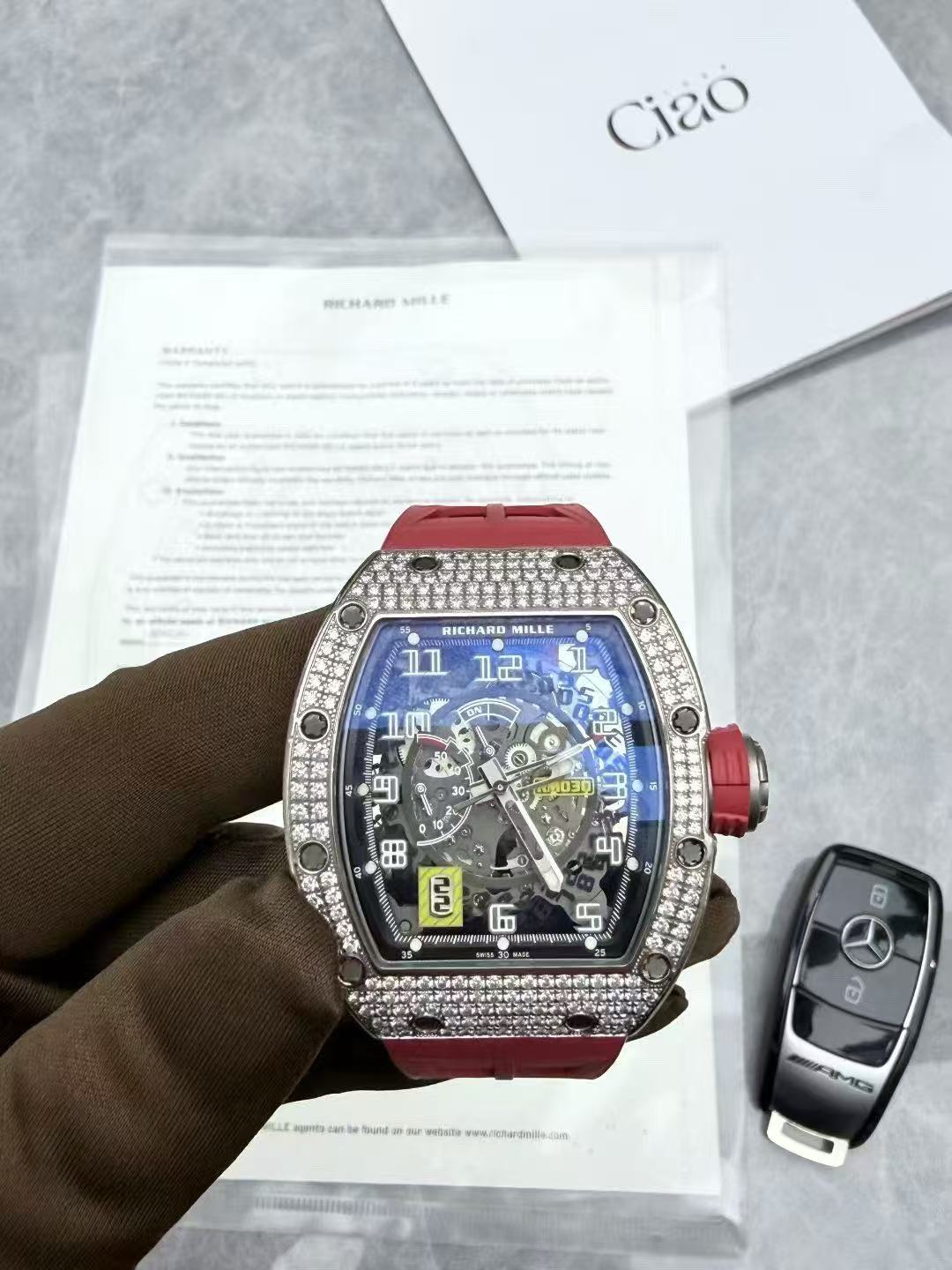 Richard Mille RM 030 in luxurious white gold, featuring factory-set diamonds and the brand’s signature tonneau-shaped case design
