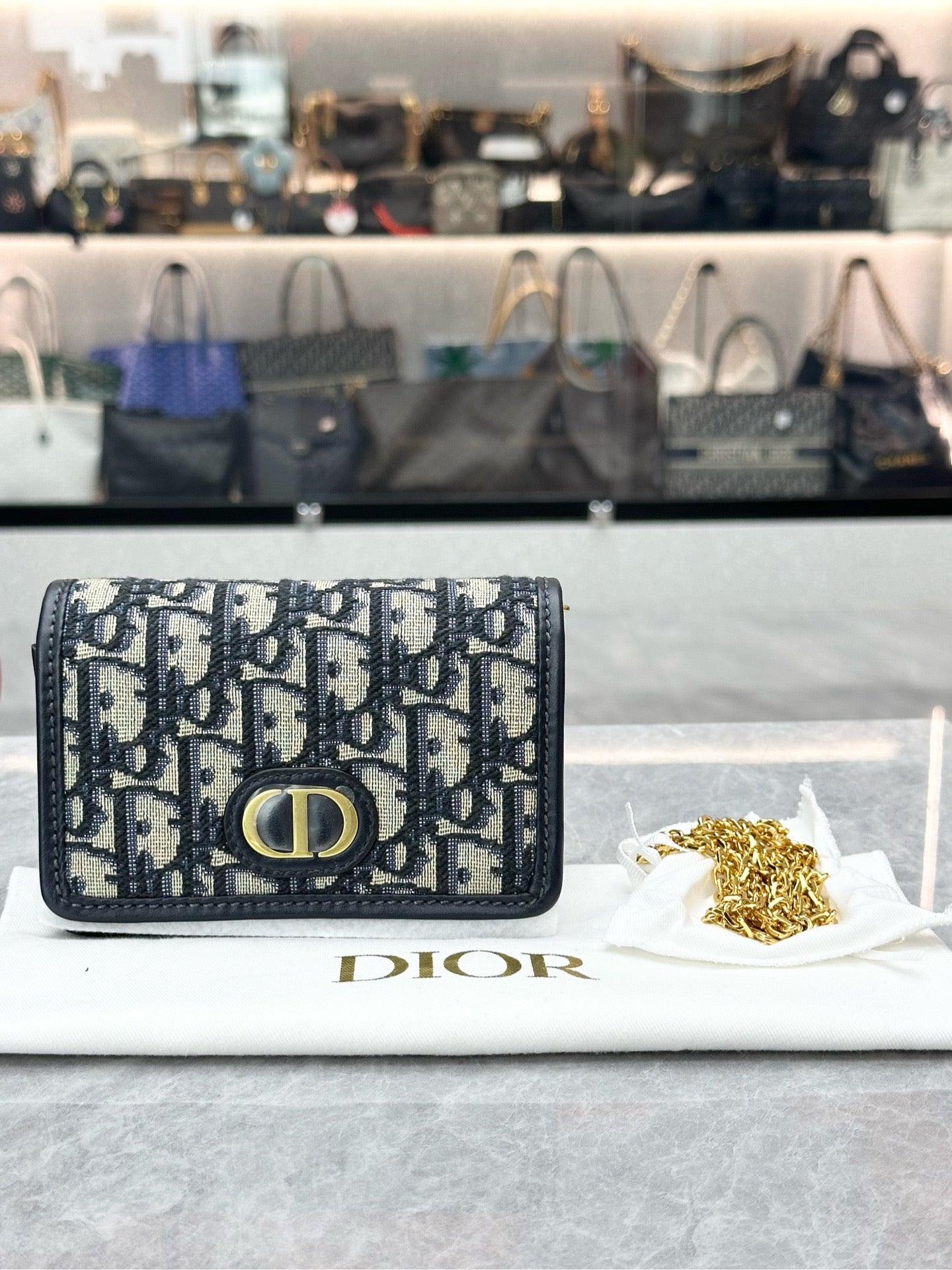 Dior 30 Montaigne Nano Pouch in blue oblique jacquard canvas