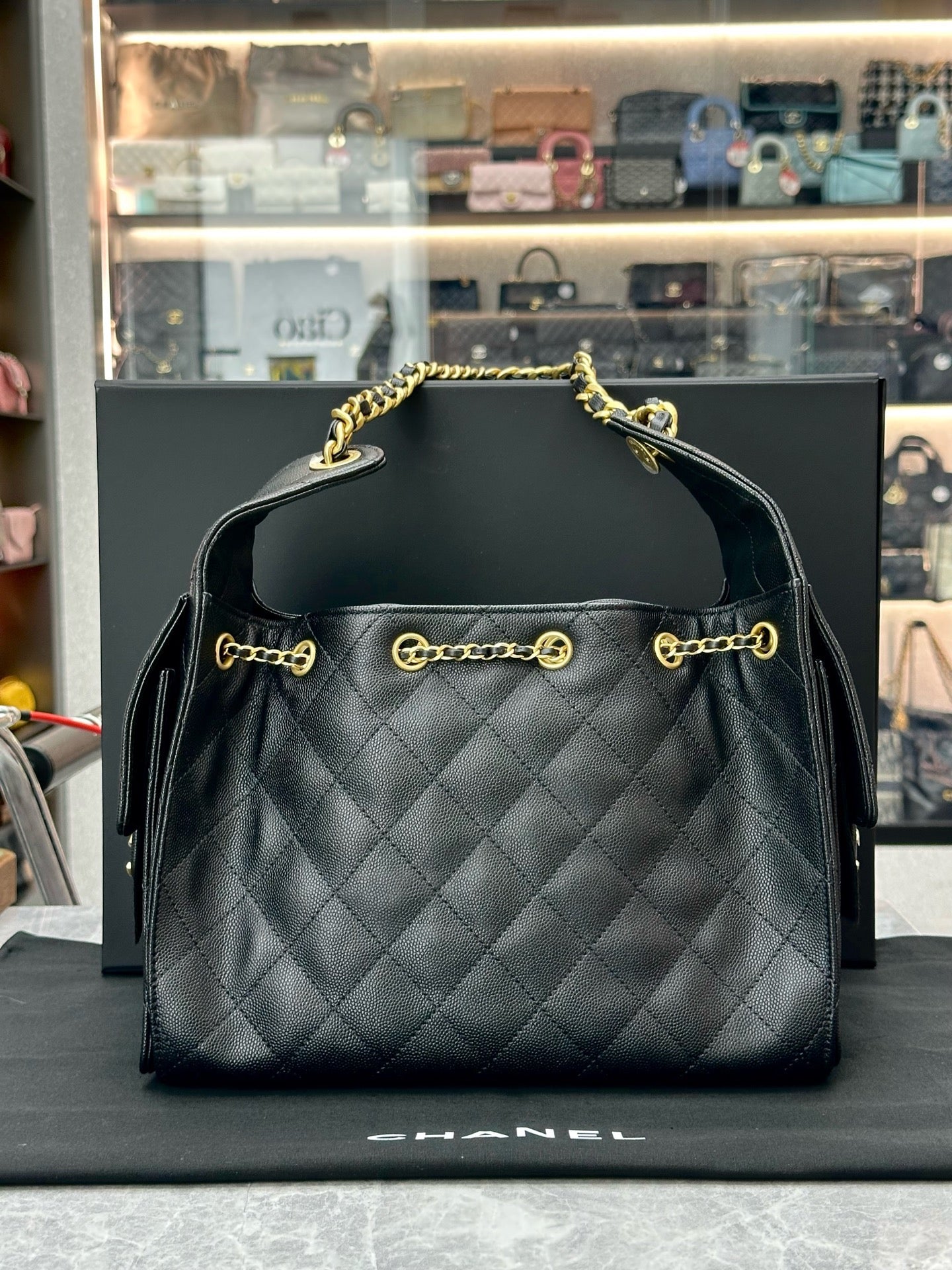 Chanel 25 black Hobo bag crafted from quilted caviar leather