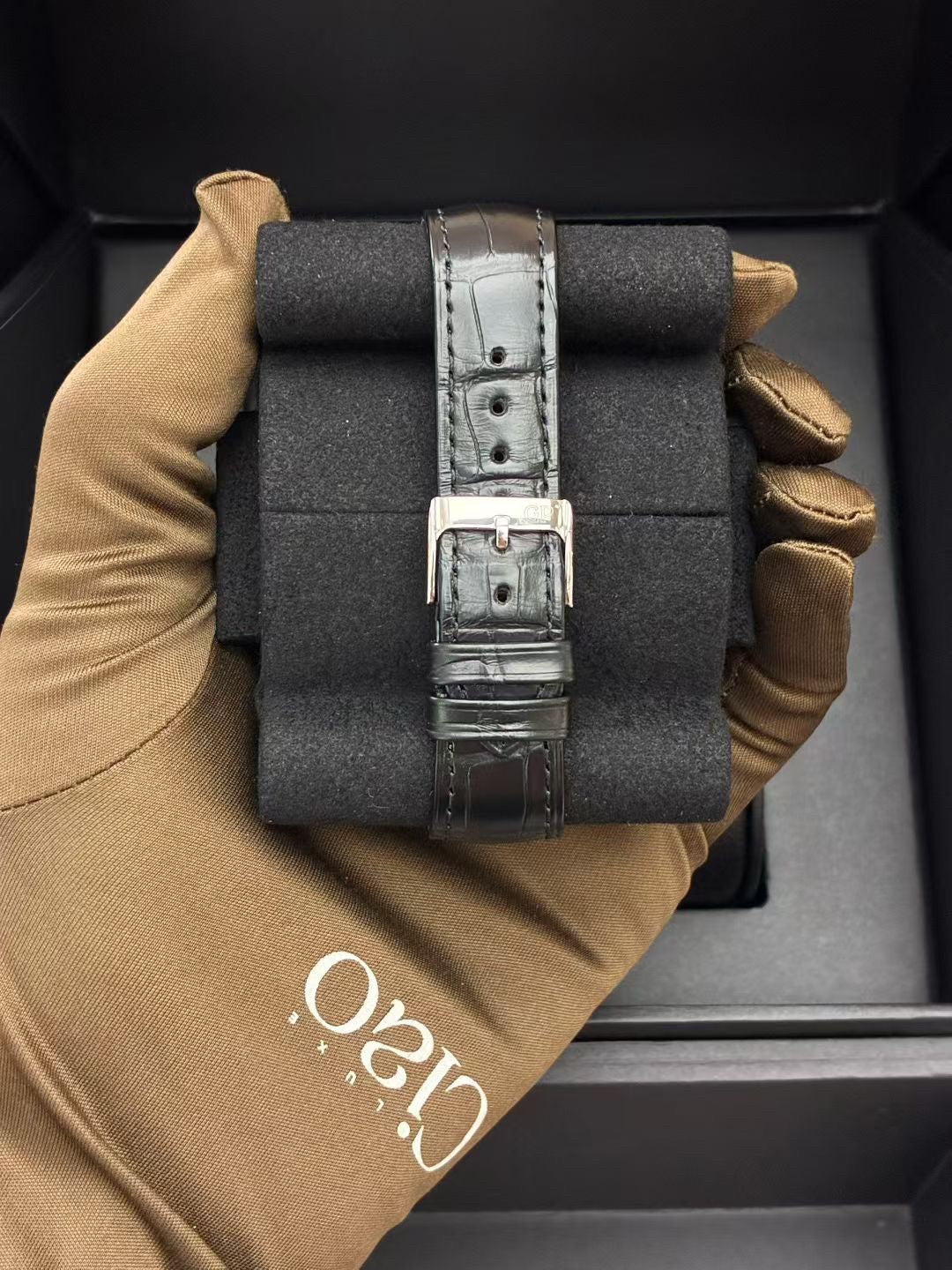 Girard-Perregaux 1966 Date & Moon Phases stainless steel watch with a silver dial and black alligator strap