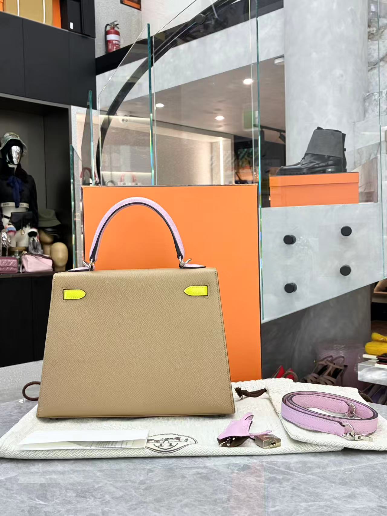 Hermès Kelly 25 Sellier handbag in tri-color Chai, Lime, and Mauve Sylvestre Epsom leather with palladium hardware