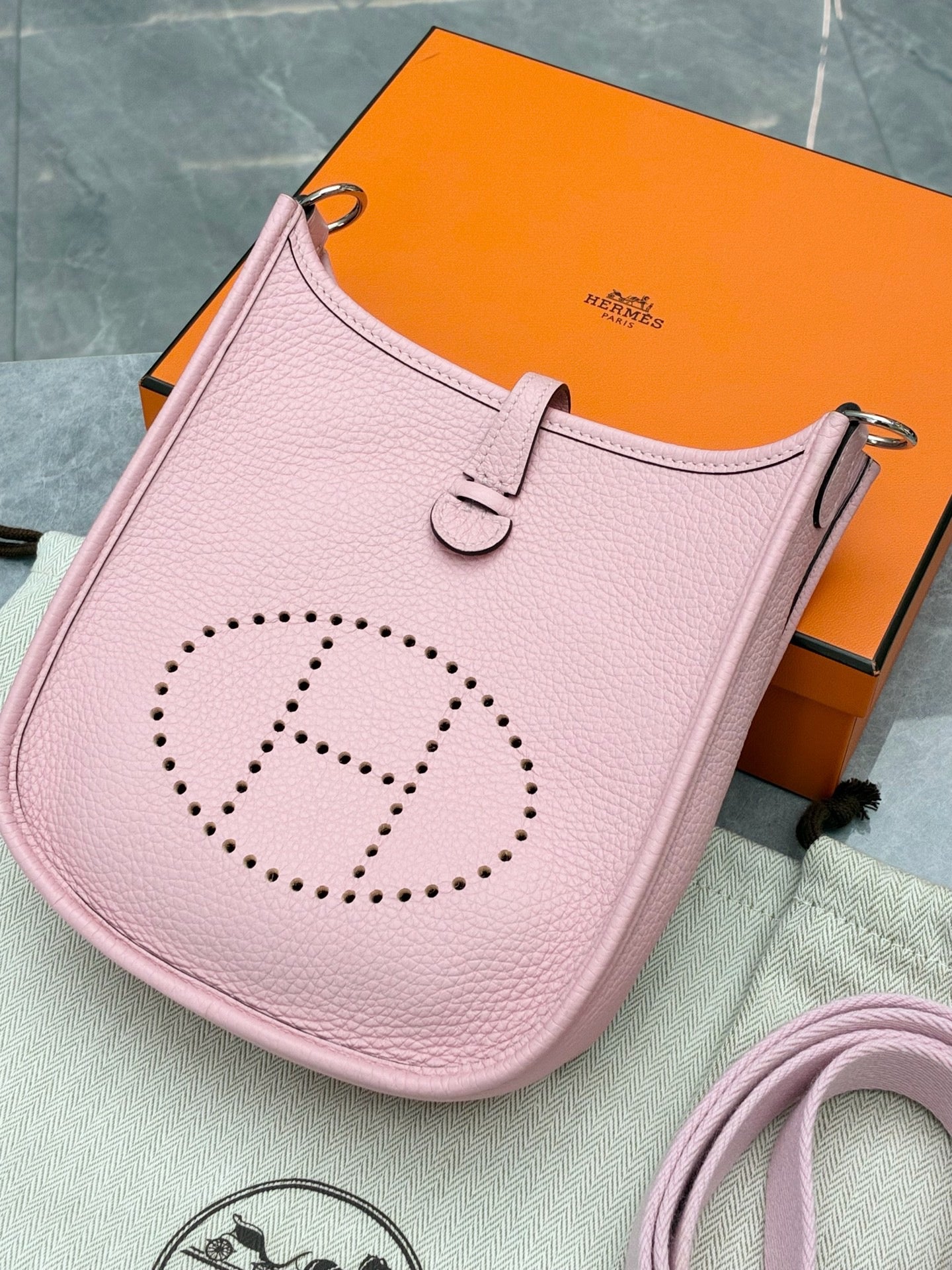 Hermès Mini Evelyne bag in Rose Sakura Clemence leather with silver-tone hardware