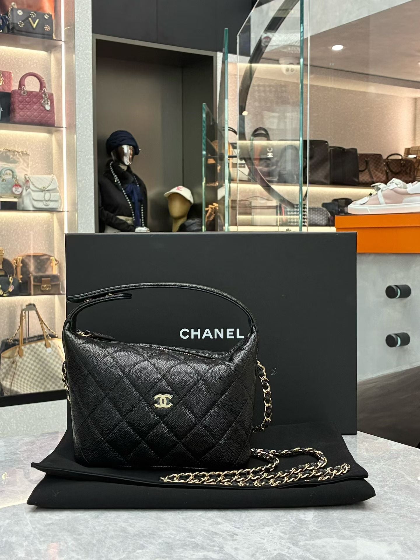 Chanel quilted caviar leather hobo clutch with chain