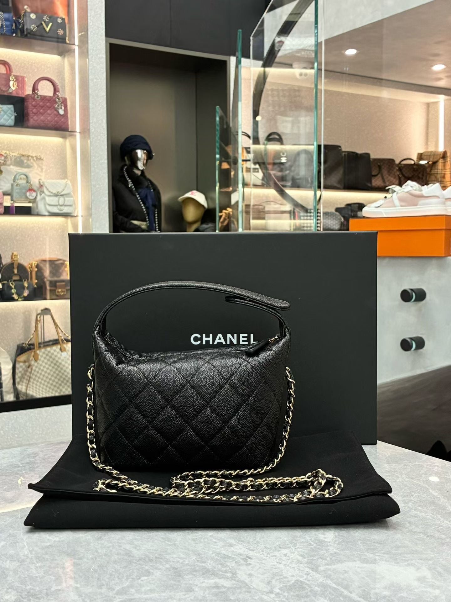 Chanel quilted caviar leather hobo clutch with chain