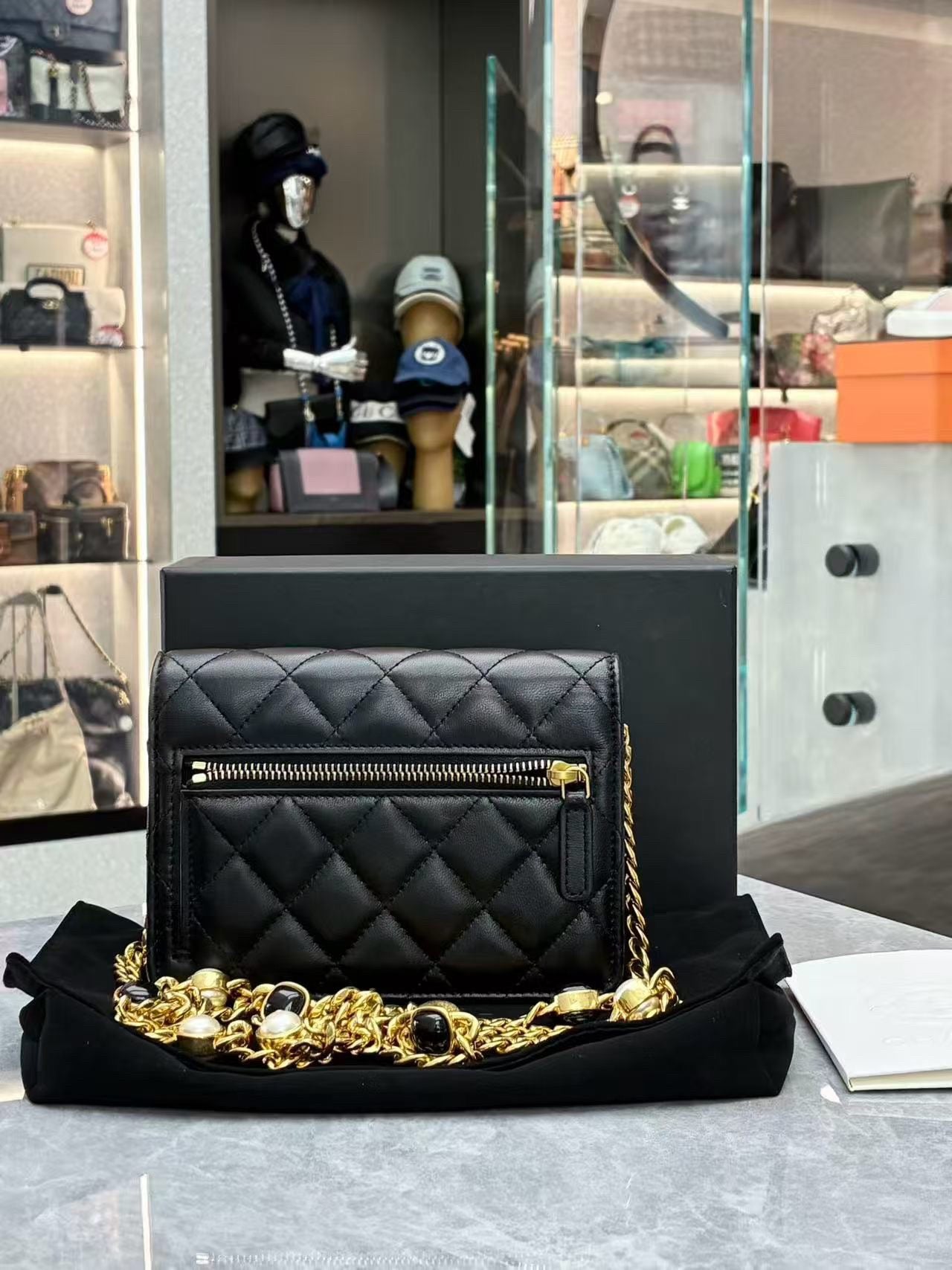 Chanel Pearl Crush Wallet on Chain in black quilted lambskin leather