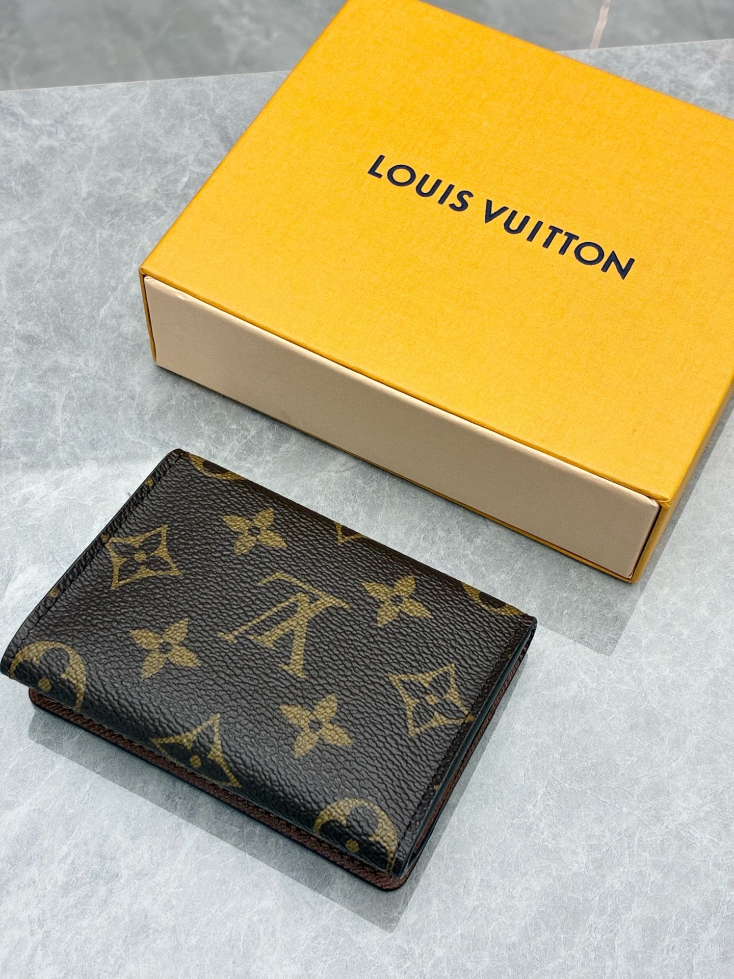Louis Vuitton Slim Card Holder (iconic Monogram coated canva)