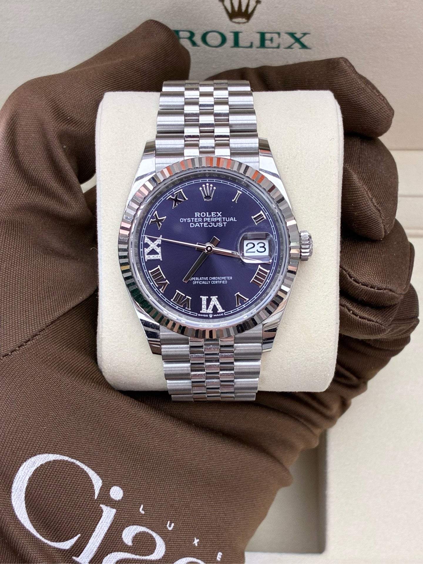 Rolex Datejust 36 126234-0021 – Oystersteel, White Gold Fluted Bezel, Blue Roman Diamond Dial, Pre-Owned