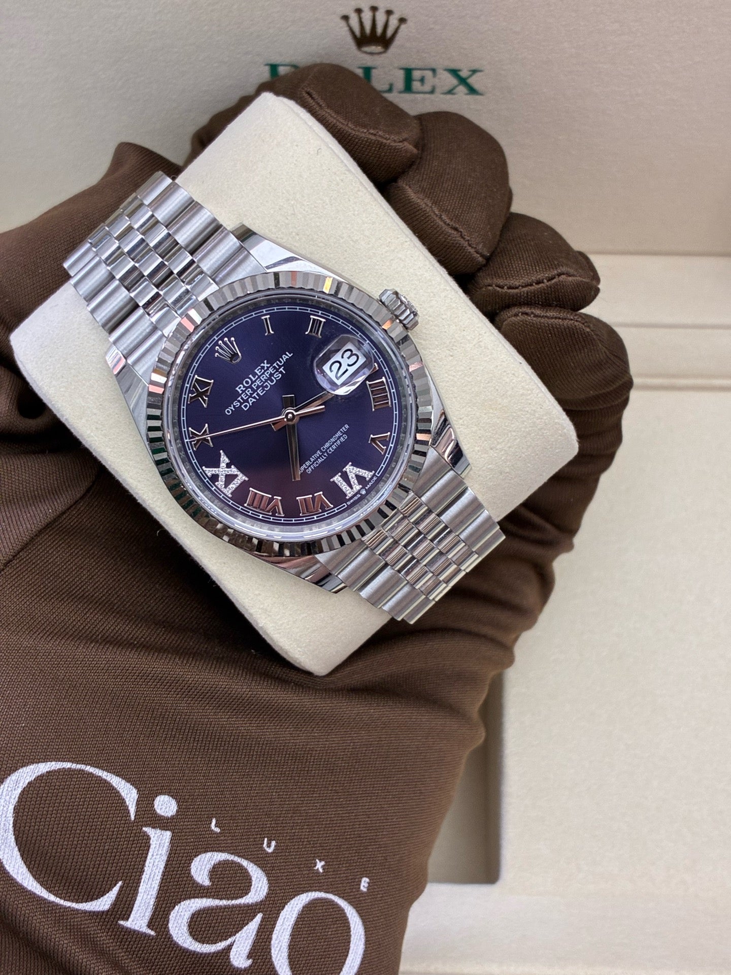 Rolex Datejust 36 126234-0021 – Oystersteel, White Gold Fluted Bezel, Blue Roman Diamond Dial, Pre-Owned