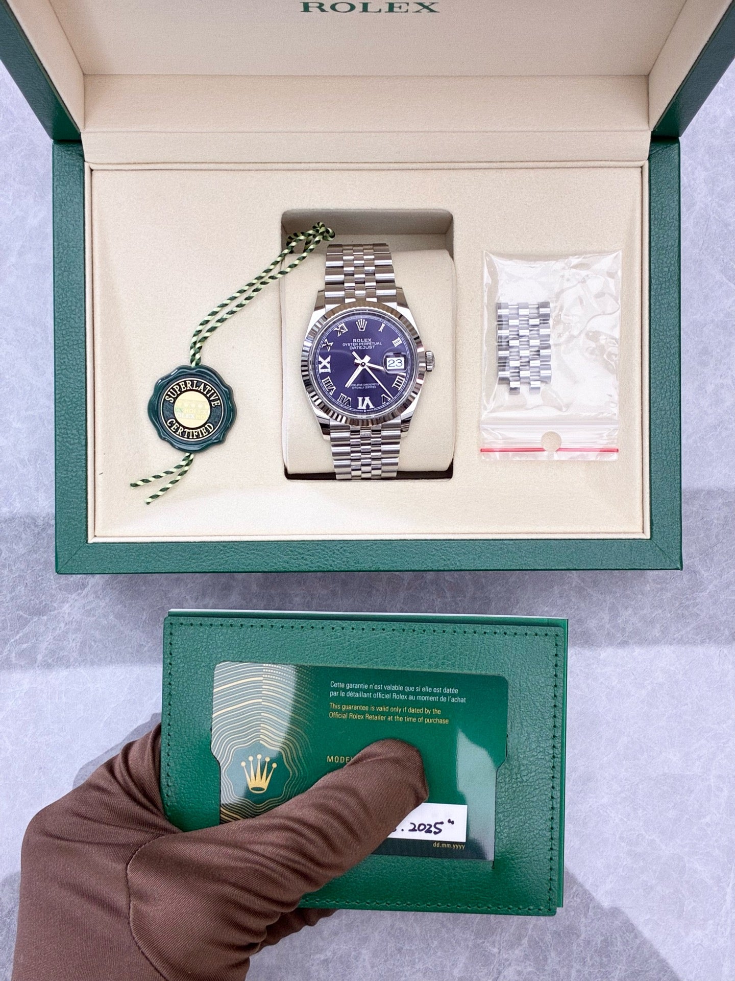 Rolex Datejust 36 126234-0021 – Oystersteel, White Gold Fluted Bezel, Blue Roman Diamond Dial, Pre-Owned