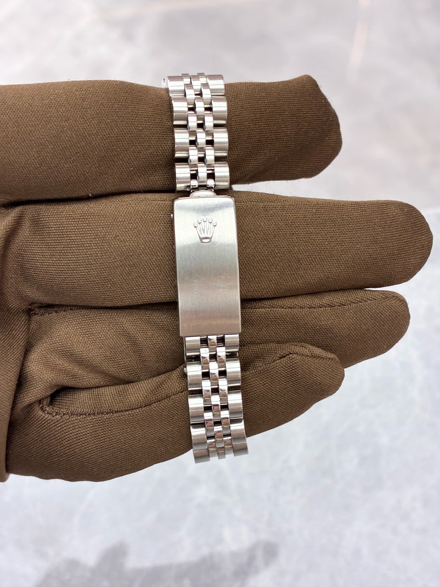 Rolex Datejust 79174 – Stainless Steel, White Gold Fluted Bezel, Black Baton Dial, Pre-Owned