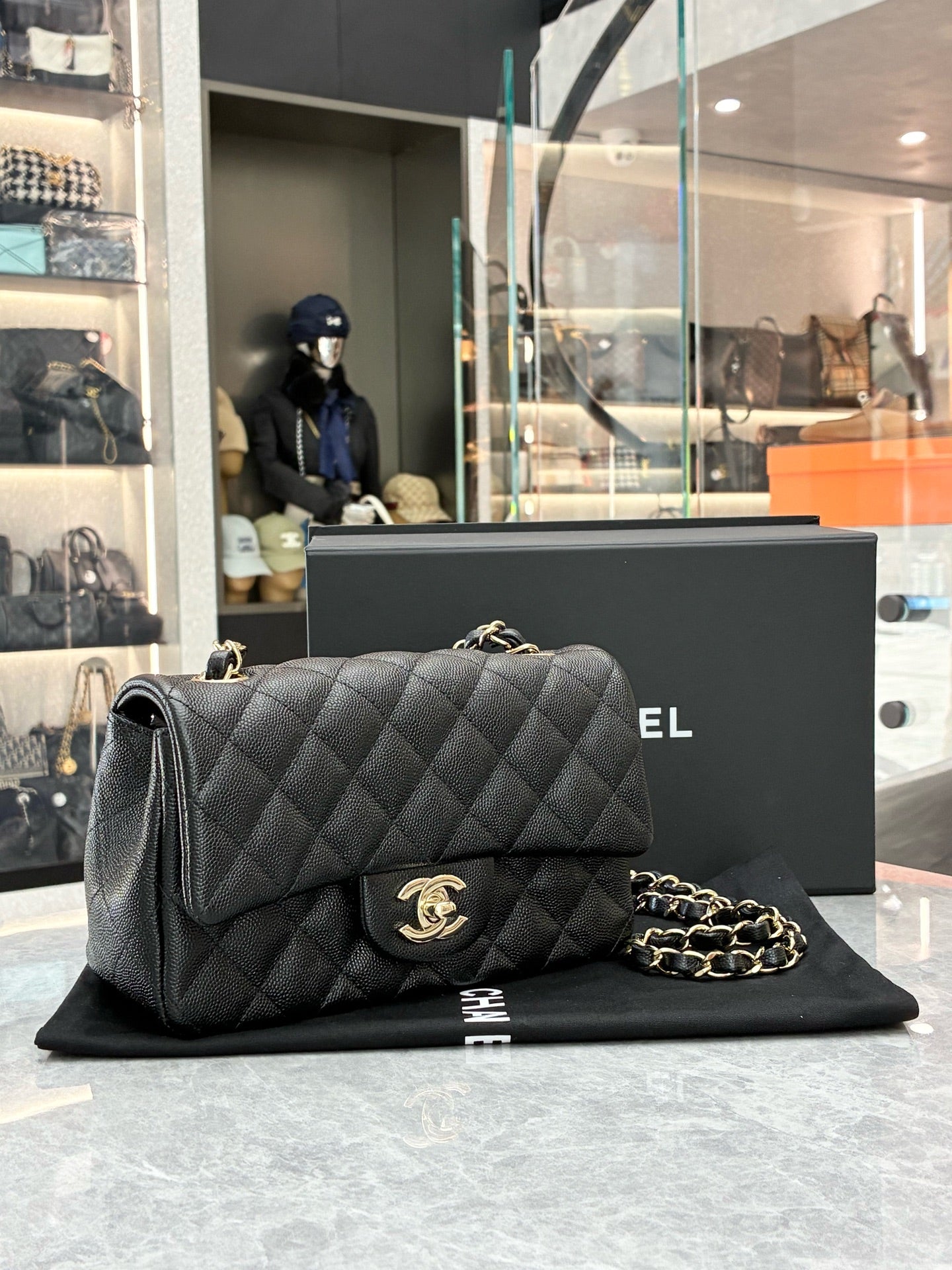 CHANEL Rectangular Mini Flap Bag – Black Caviar Leather, Champagne Gold Hardware, Pre-Owned