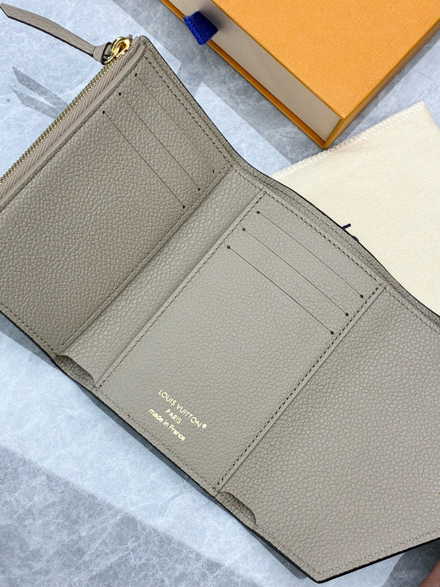 LOUIS VUITTON Victorine Wallet – Elephant Grey Monogram Empreinte, Gold Hardware, Brand New
