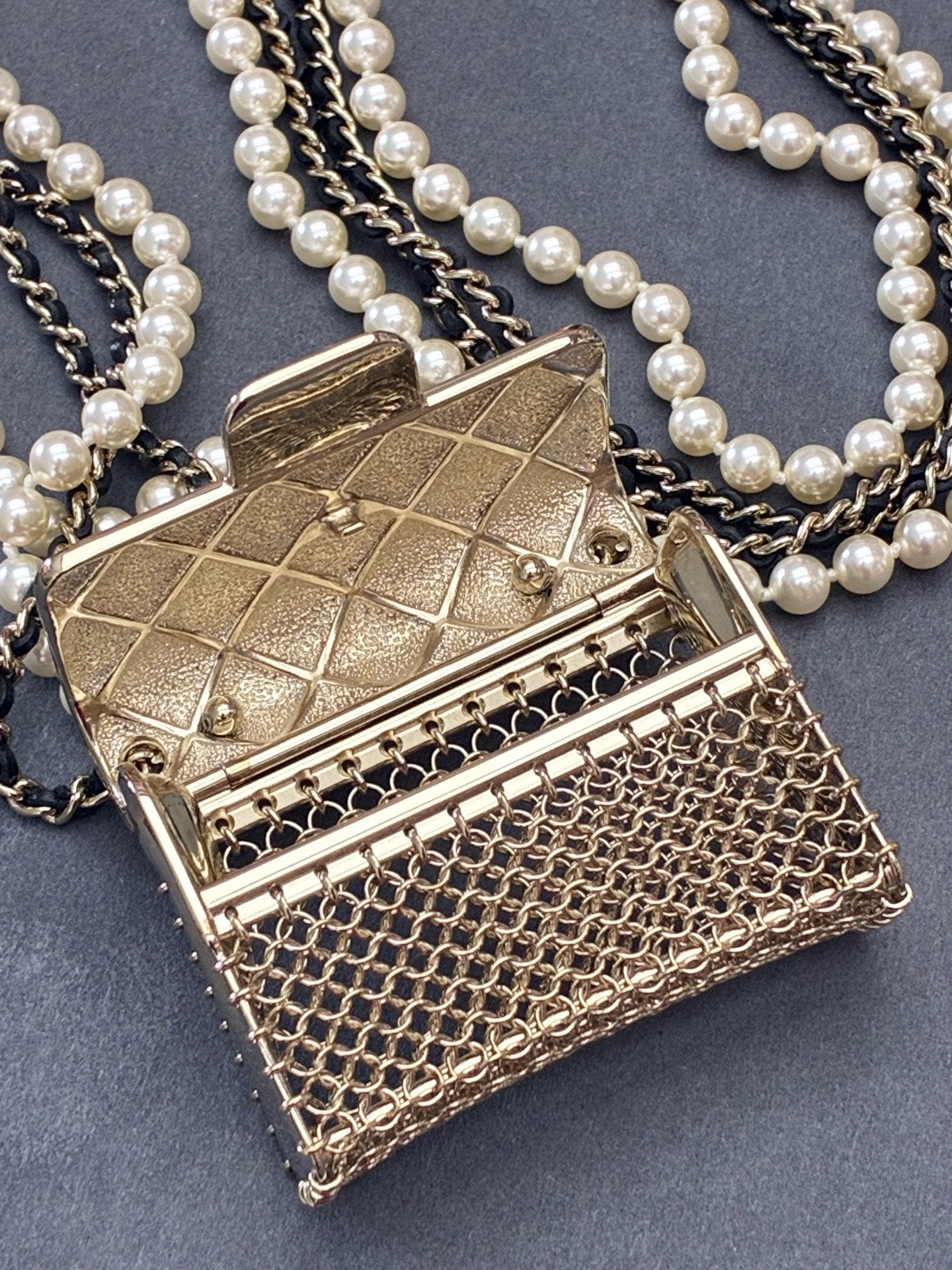 CHANEL 21S Tiny Bag Necklace – Gold-Tone Metal, Pearl & Leather-Woven Chain, Very Good Pre-Owned