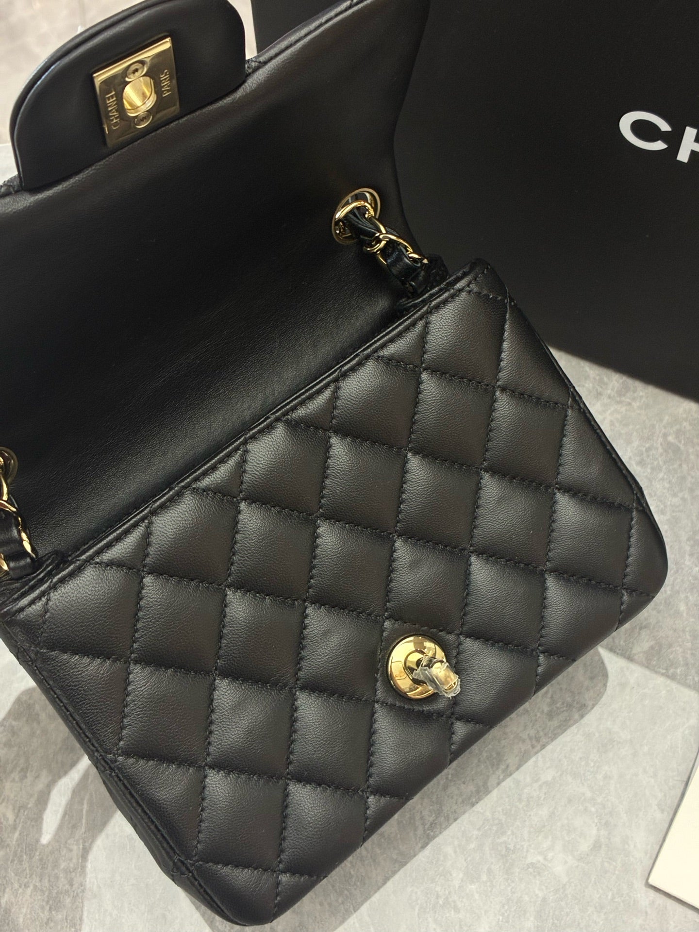 CHANEL Classic Flap Mini Square – Black Lambskin, Champagne Gold Hardware, Reference A69900, Excellent Pre-Owned