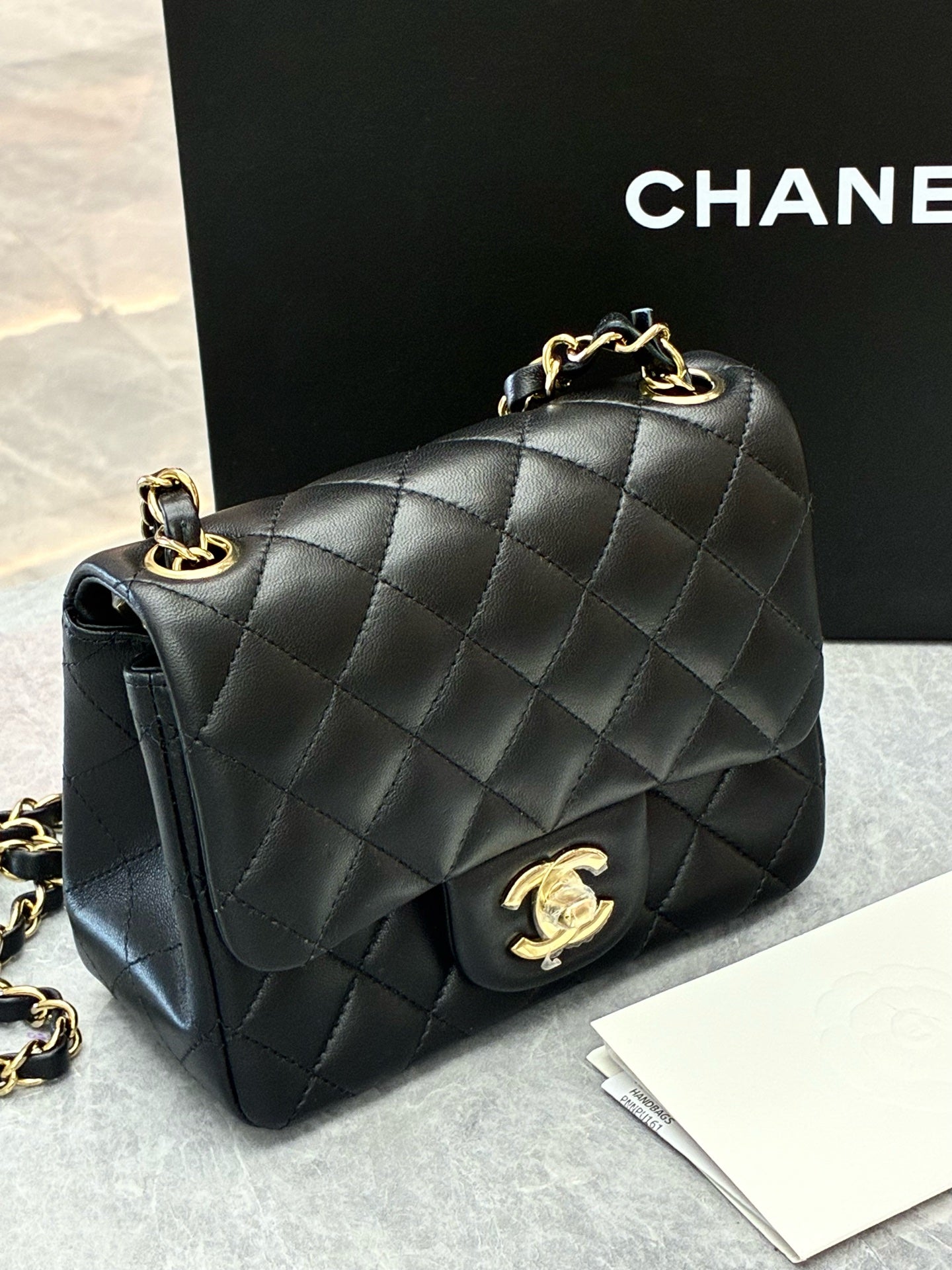 CHANEL Classic Flap Mini Square – Black Lambskin, Champagne Gold Hardware, Reference A69900, Excellent Pre-Owned