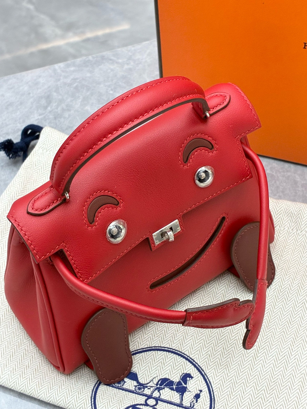 HERMÈS Kelly Doll – Sunshine Red & Rouge Casaque Two-Tone Leather, Palladium Hardware, W Stamp, Brand New