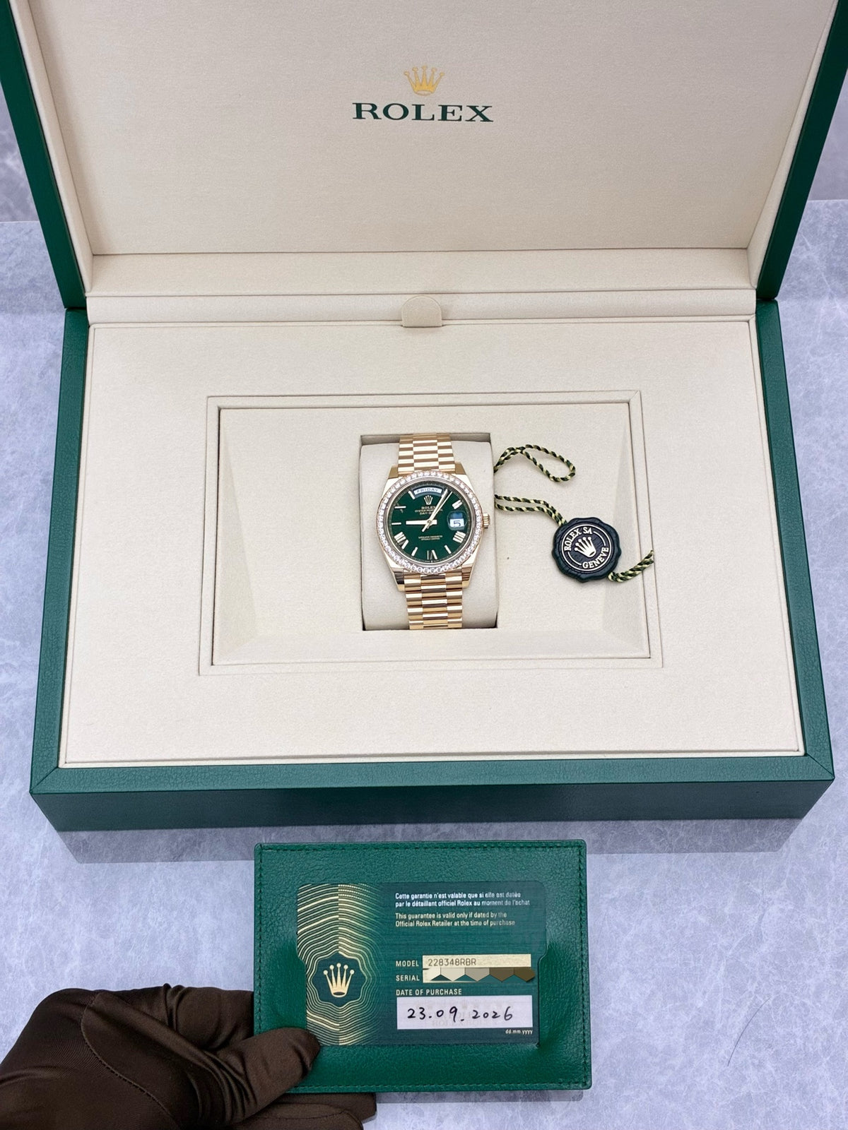 ROLEX Day-Date 40 228348RBR-0040 – Yellow Gold, Diamond-Set Bezel, Green Roman Dial, President Bracelet, 2026, Brand New (No Box)