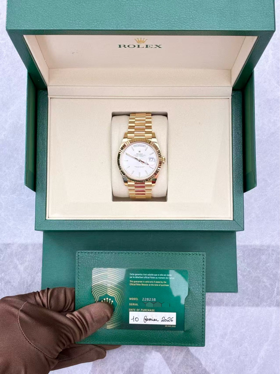 ROLEX Day-Date 40 228238-0066 – Yellow Gold, White Dial, Fluted Bezel, President Bracelet, Feb 2026, Brand New