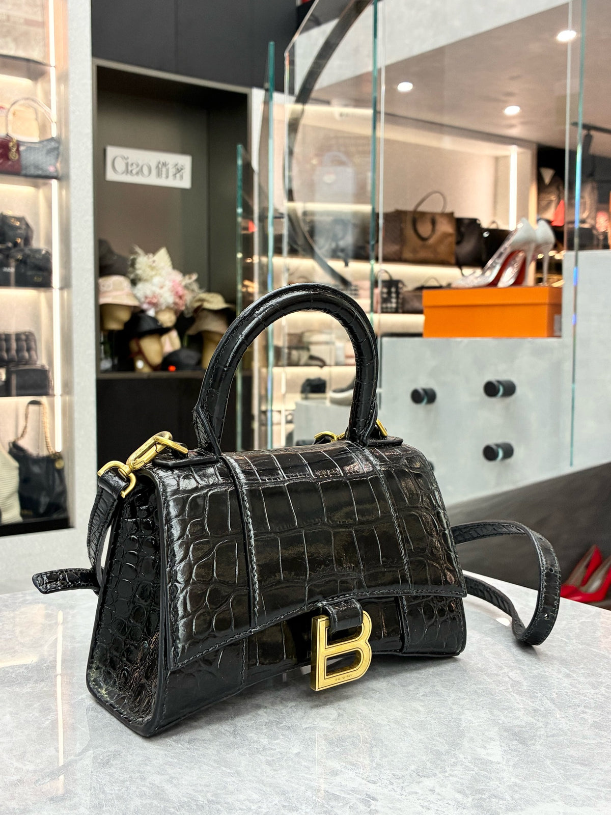 BALENCIAGA Hourglass XS – Black Crocodile-Embossed Calfskin, Gold Hardware, Good Pre-Owned