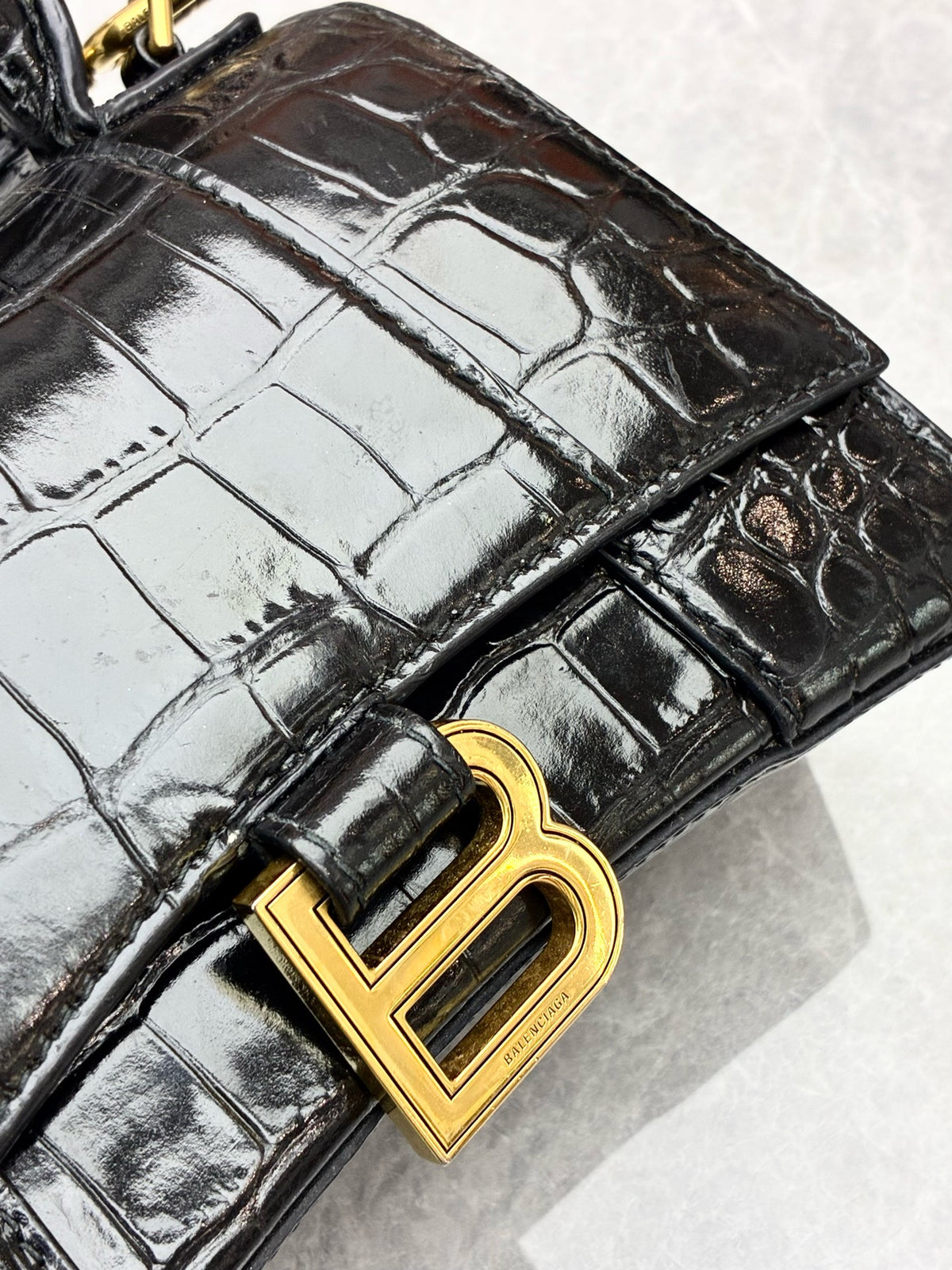 BALENCIAGA Hourglass XS – Black Crocodile-Embossed Calfskin, Gold Hardware, Good Pre-Owned