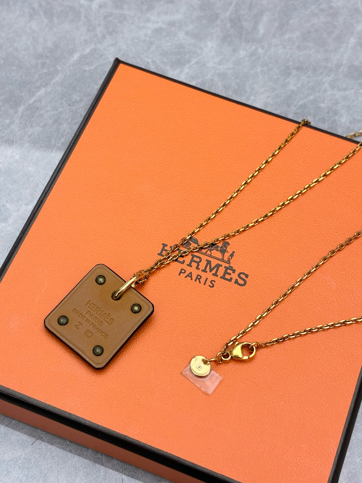 HERMÈS As de Coeur Necklace – Rose Gold Heart Pendant on Gold-Brown Leather Cord