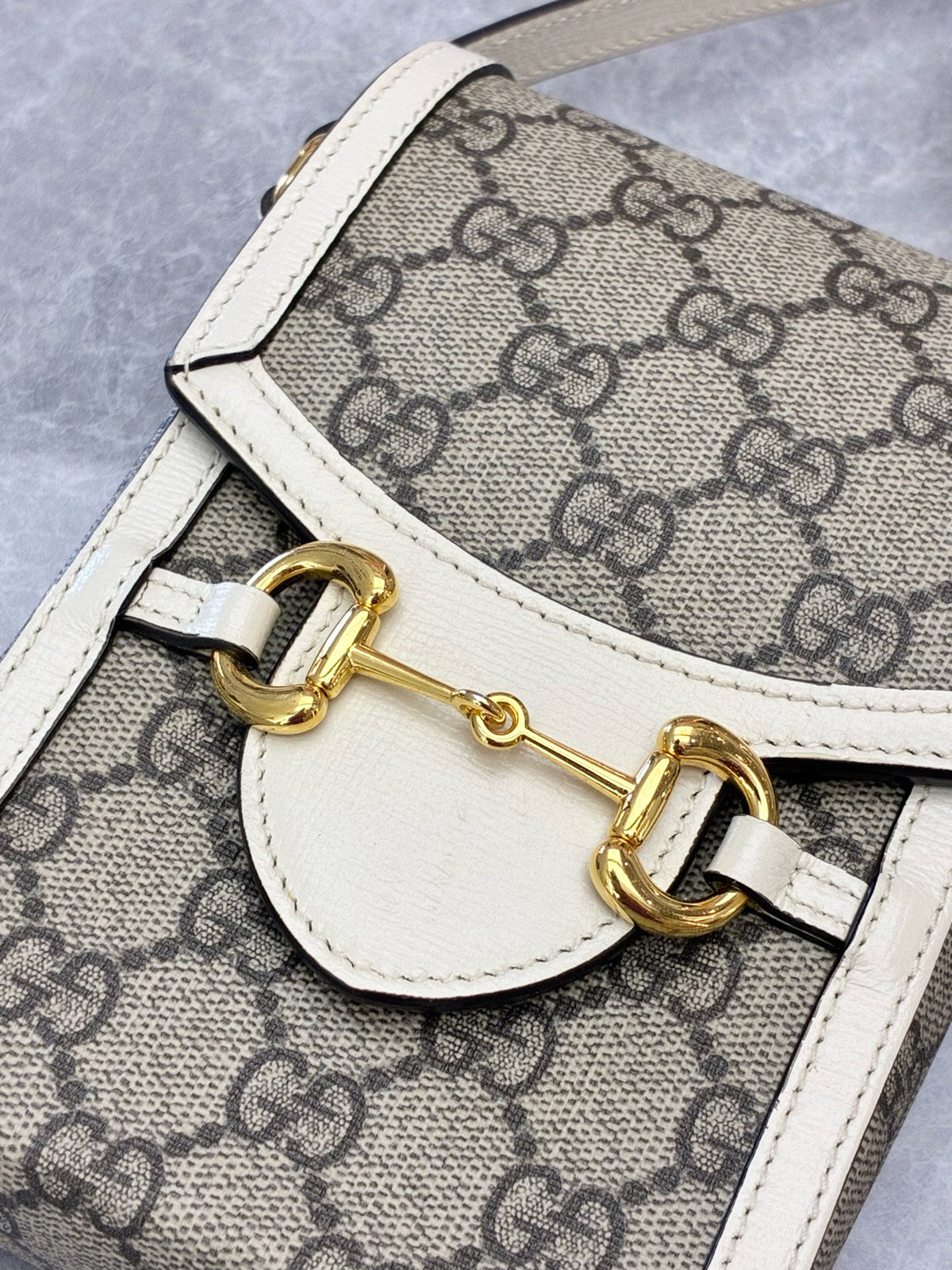 GUCCI Horsebit 1955 Mini Bag – Beige GG Supreme Canvas with White Leather Trim, Gold Hardware, Good Pre-Owned