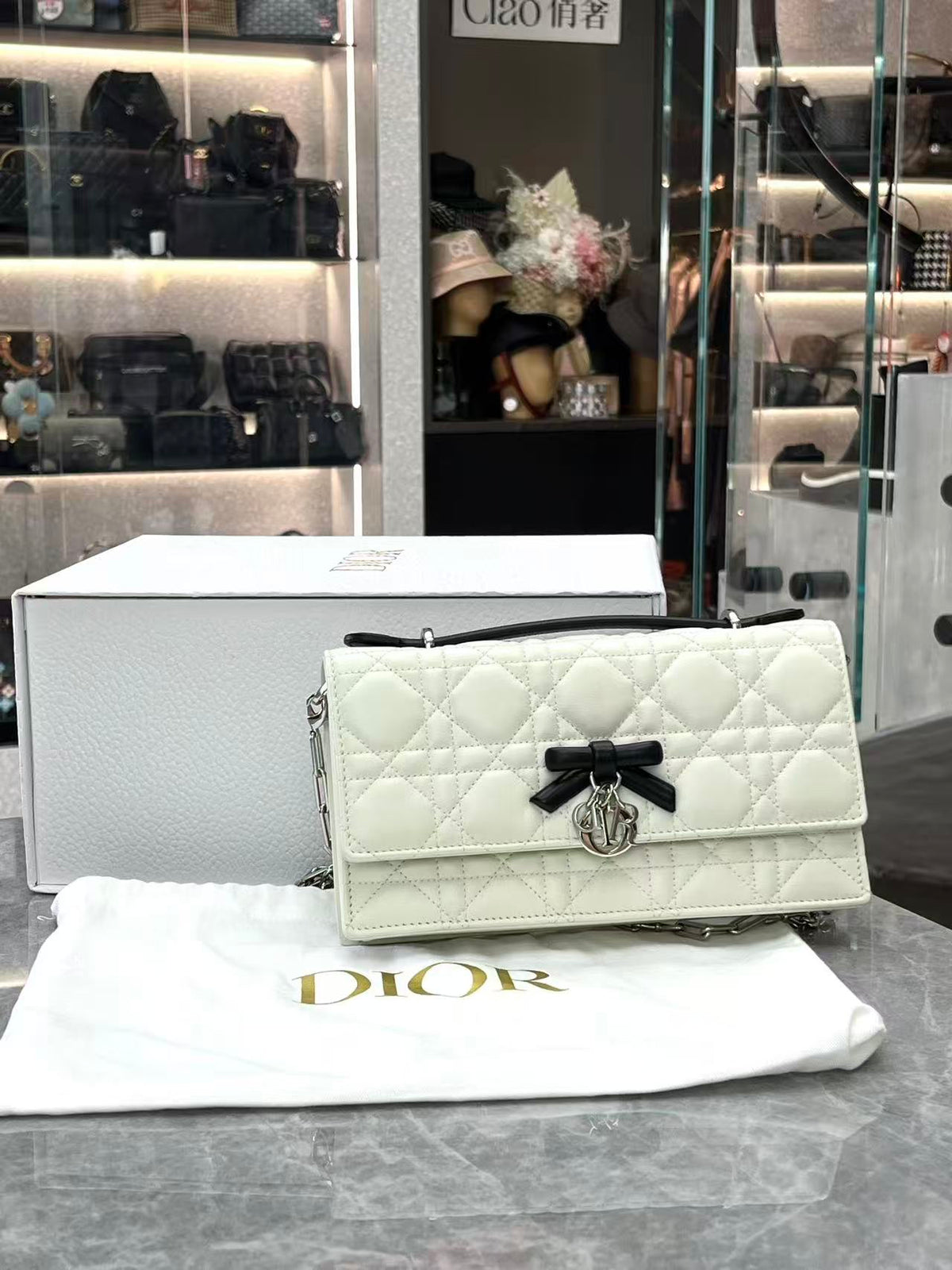 CHRISTIAN DIOR Lady Dior East-West – Ivory Cannage Lambskin with Black Bow, Silver Hardware, Excellent Pre-Owned