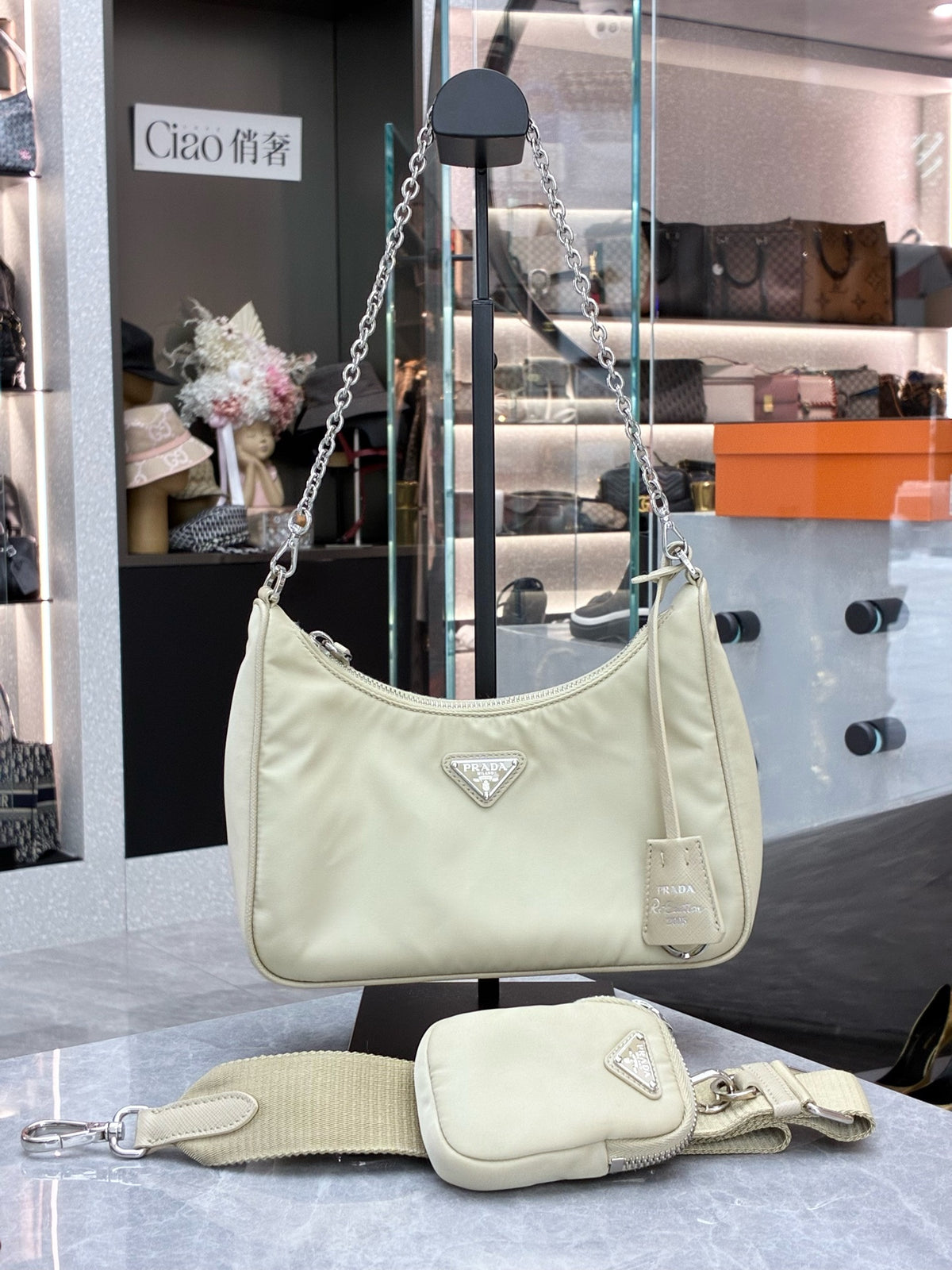 PRADA Re-Nylon Hobo Bag – Milk Tea Nylon with Silver Chain and Woven Strap, Convertible, Good Pre-Owned