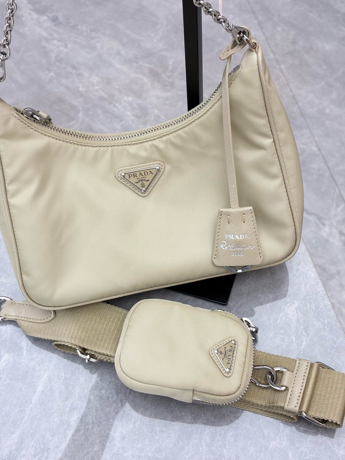 PRADA Re-Nylon Hobo Bag – Milk Tea Nylon with Silver Chain and Woven Strap, Convertible, Good Pre-Owned