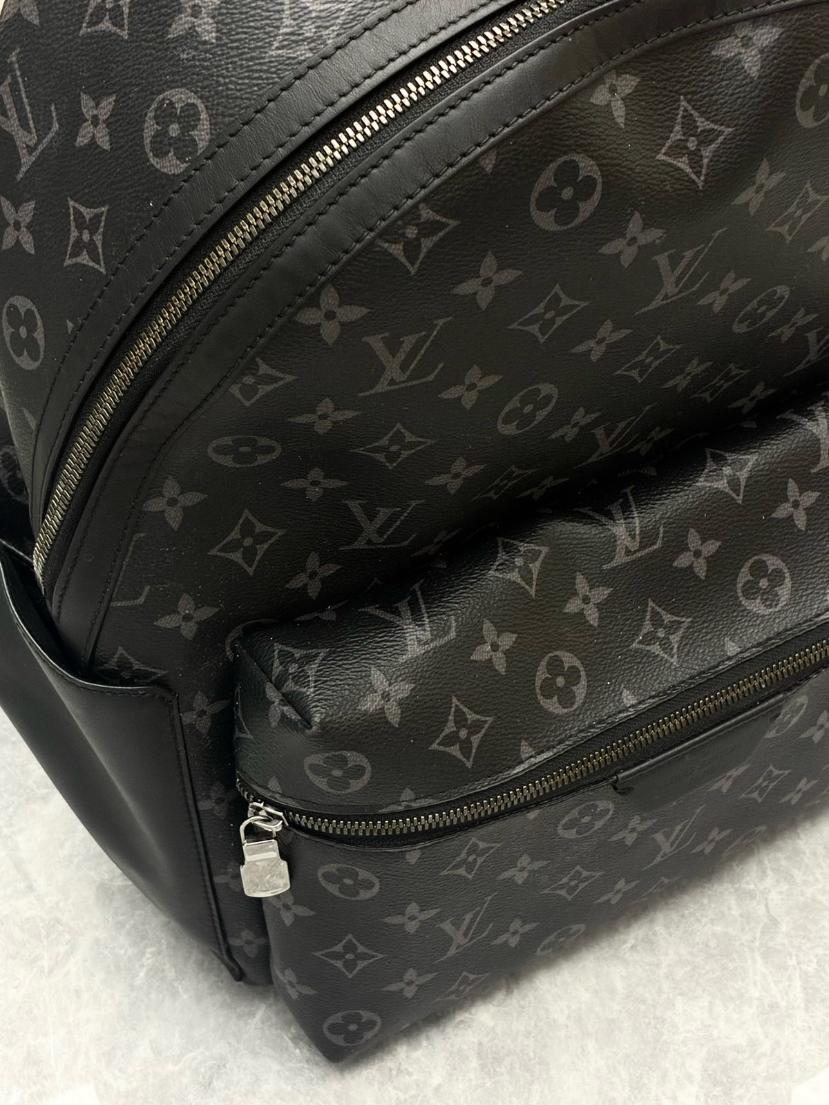 LOUIS VUITTON Discovery Microchip Backpack – Black Monogram Coated Canvas with Black Calfskin, Good Pre-Owned