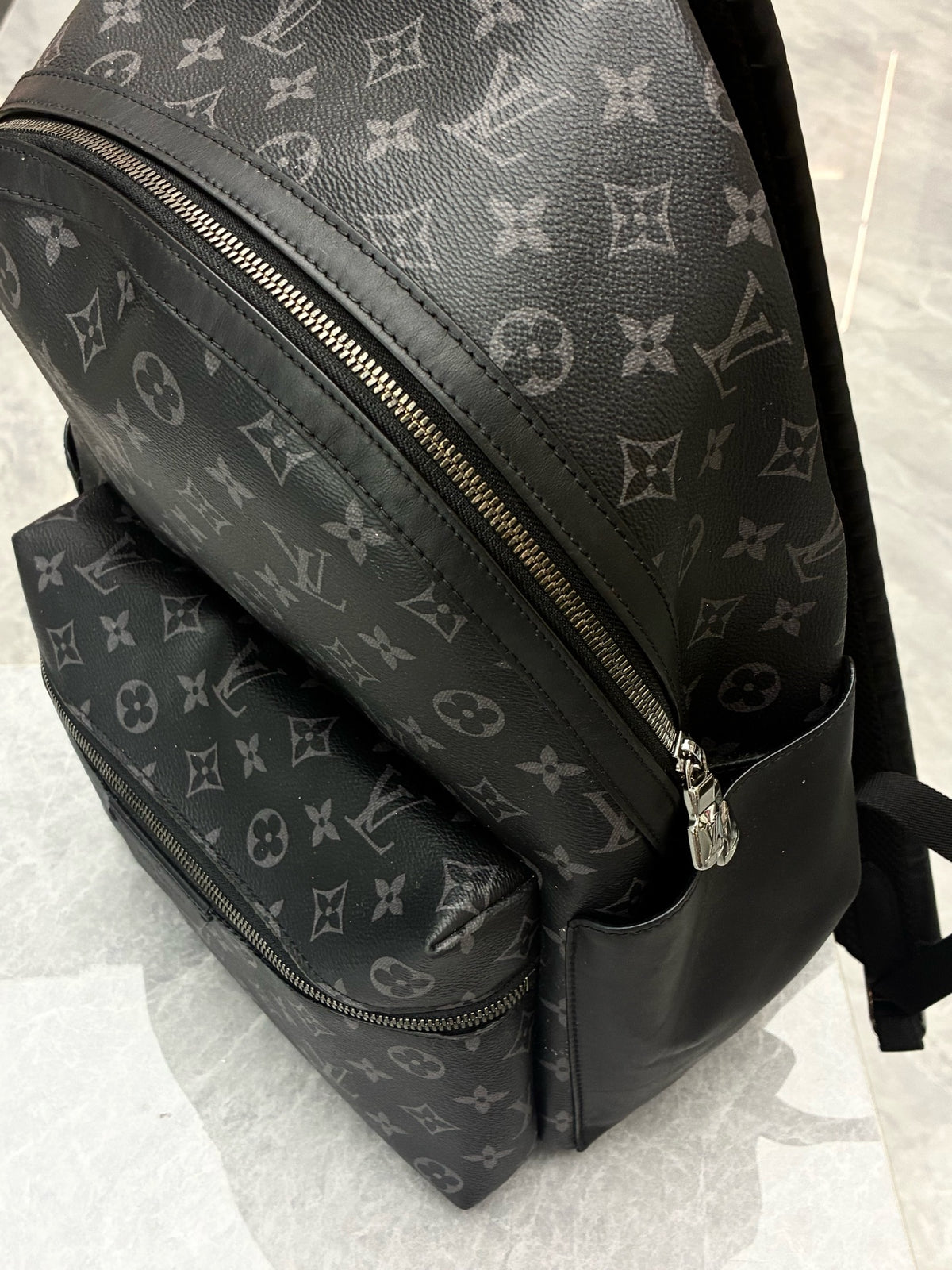 LOUIS VUITTON Discovery Microchip Backpack – Black Monogram Coated Canvas with Black Calfskin, Good Pre-Owned