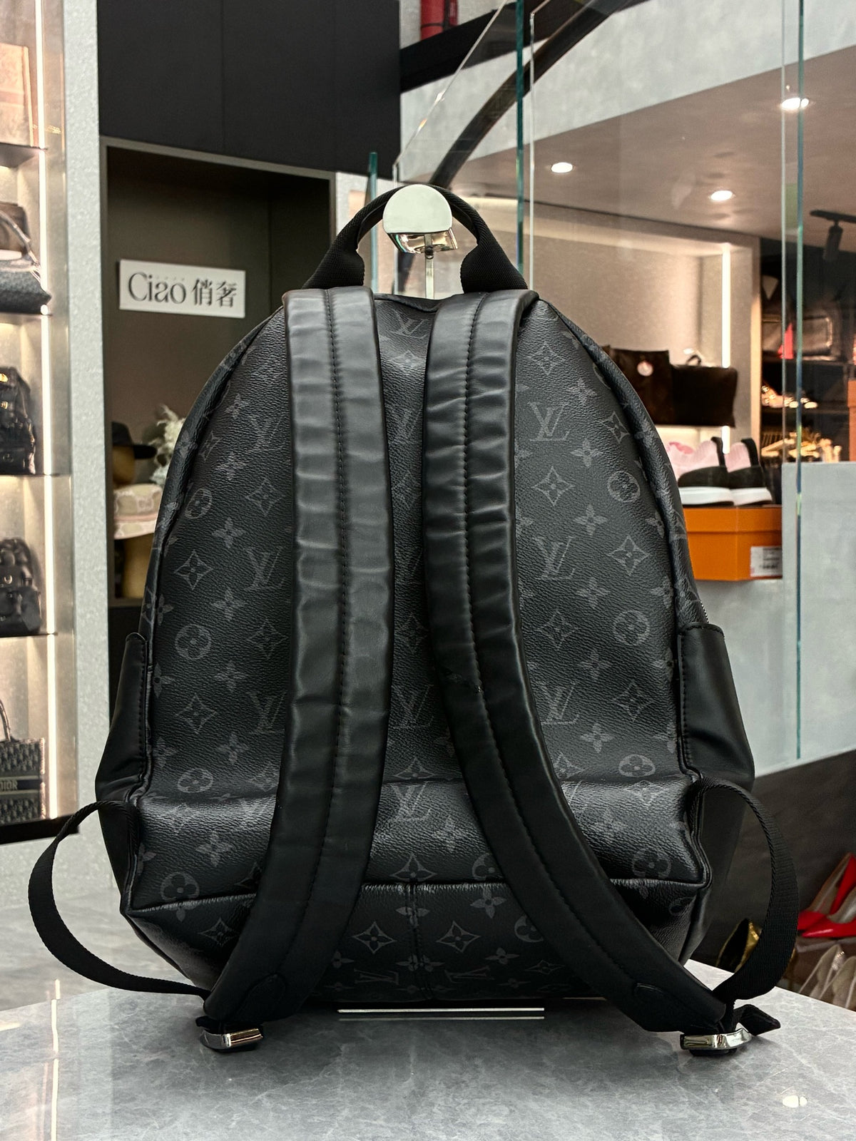 LOUIS VUITTON Discovery Microchip Backpack – Black Monogram Coated Canvas with Black Calfskin, Good Pre-Owned