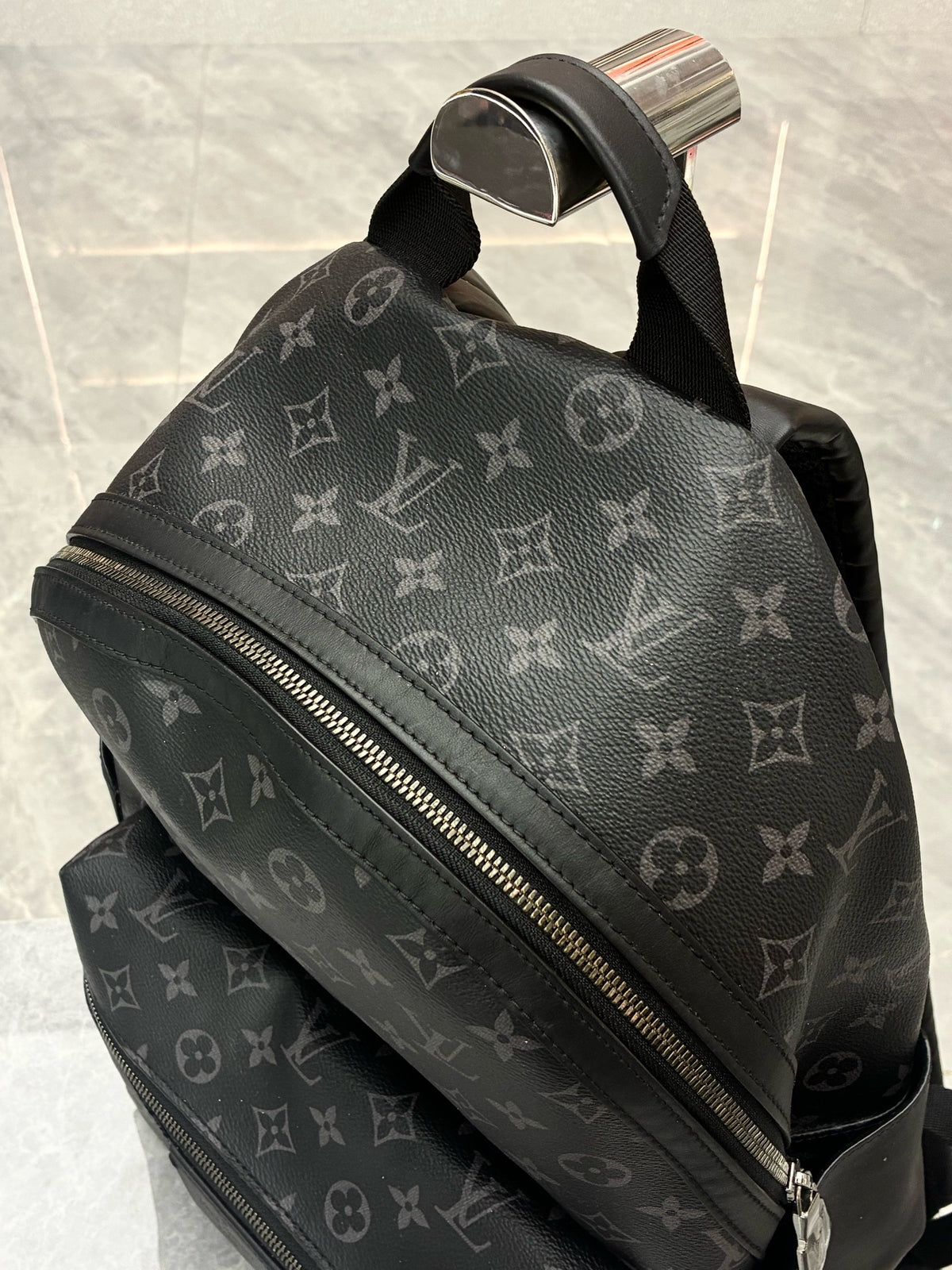 LOUIS VUITTON Discovery Microchip Backpack – Black Monogram Coated Canvas with Black Calfskin, Good Pre-Owned