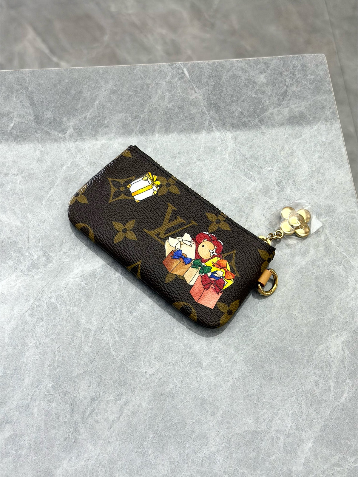 LOUIS VUITTON Vivienne Holiday Clutch – Monogram Coated Canvas with Cartoon Motif and Gold-Tone Hardware, Very Good Pre-Owned