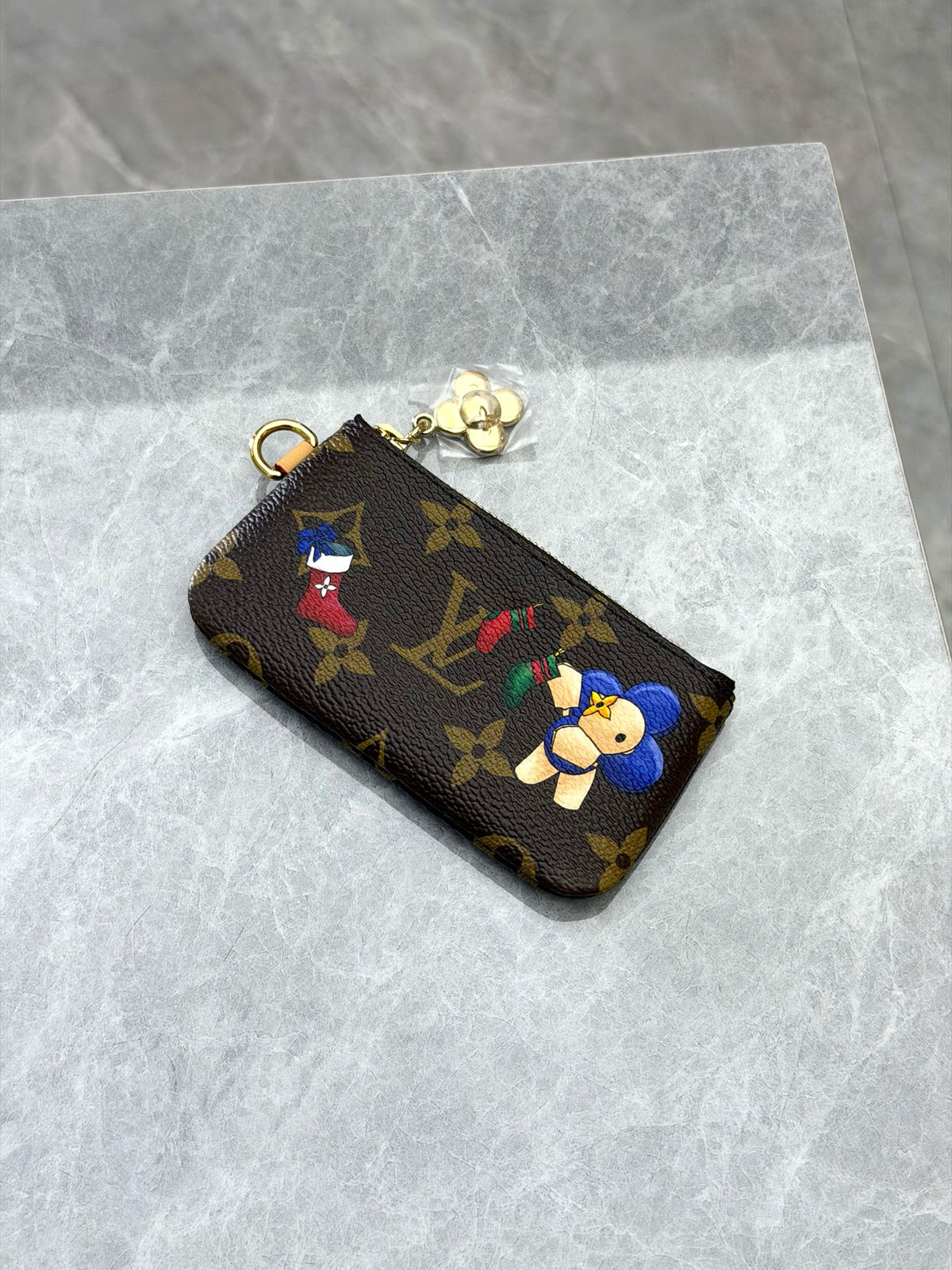 LOUIS VUITTON Vivienne Holiday Clutch – Monogram Coated Canvas with Cartoon Motif and Gold-Tone Hardware, Very Good Pre-Owned