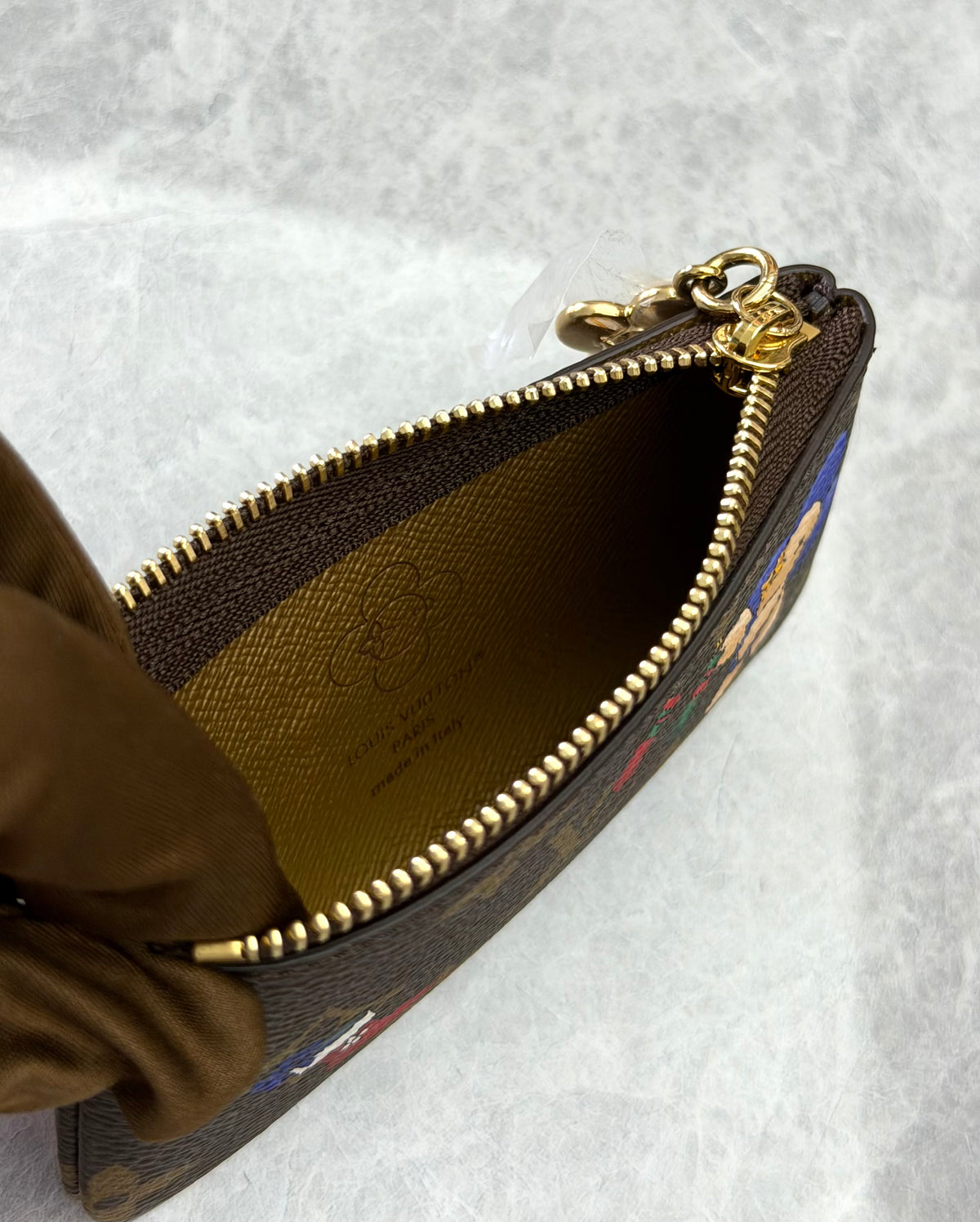 LOUIS VUITTON Vivienne Holiday Clutch – Monogram Coated Canvas with Cartoon Motif and Gold-Tone Hardware, Very Good Pre-Owned