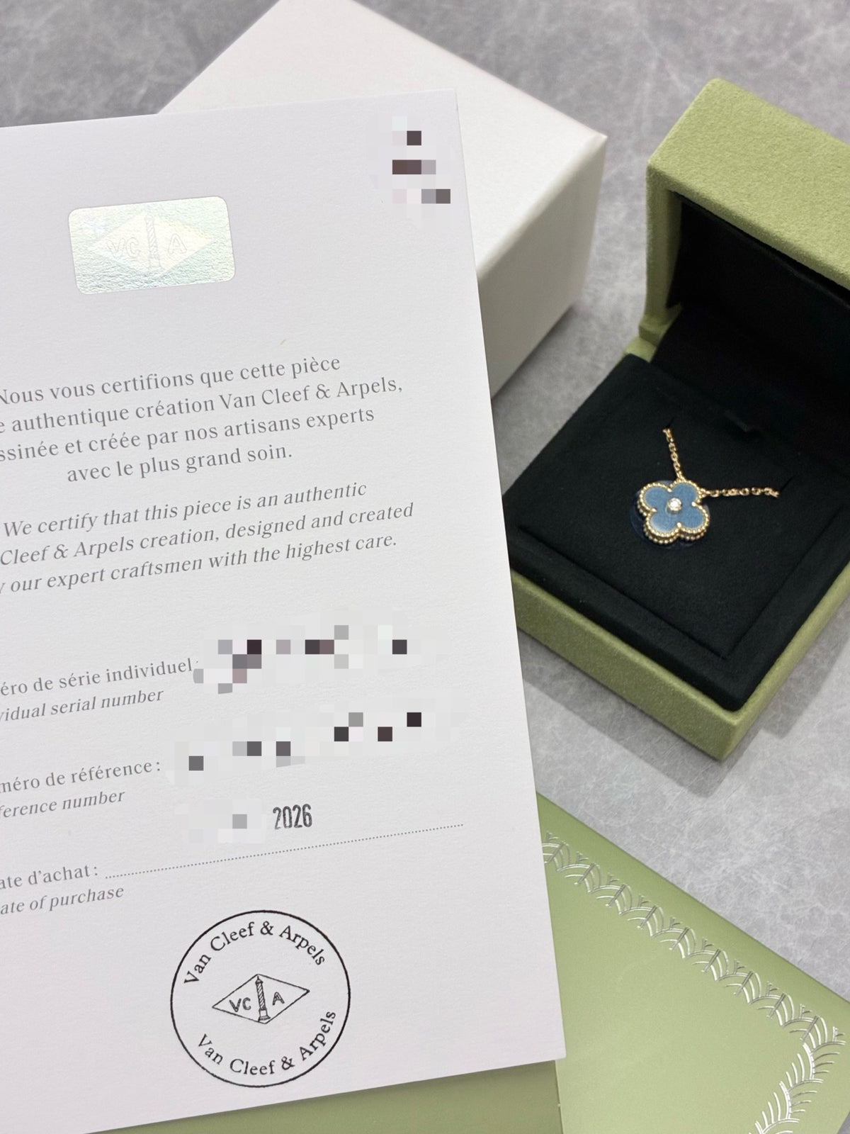 VAN CLEEF & ARPELS Holiday Limited Edition 2026 Alhambra Pendant – Blue-Grey Ceramic with Gold and Diamond Rim, Brand New